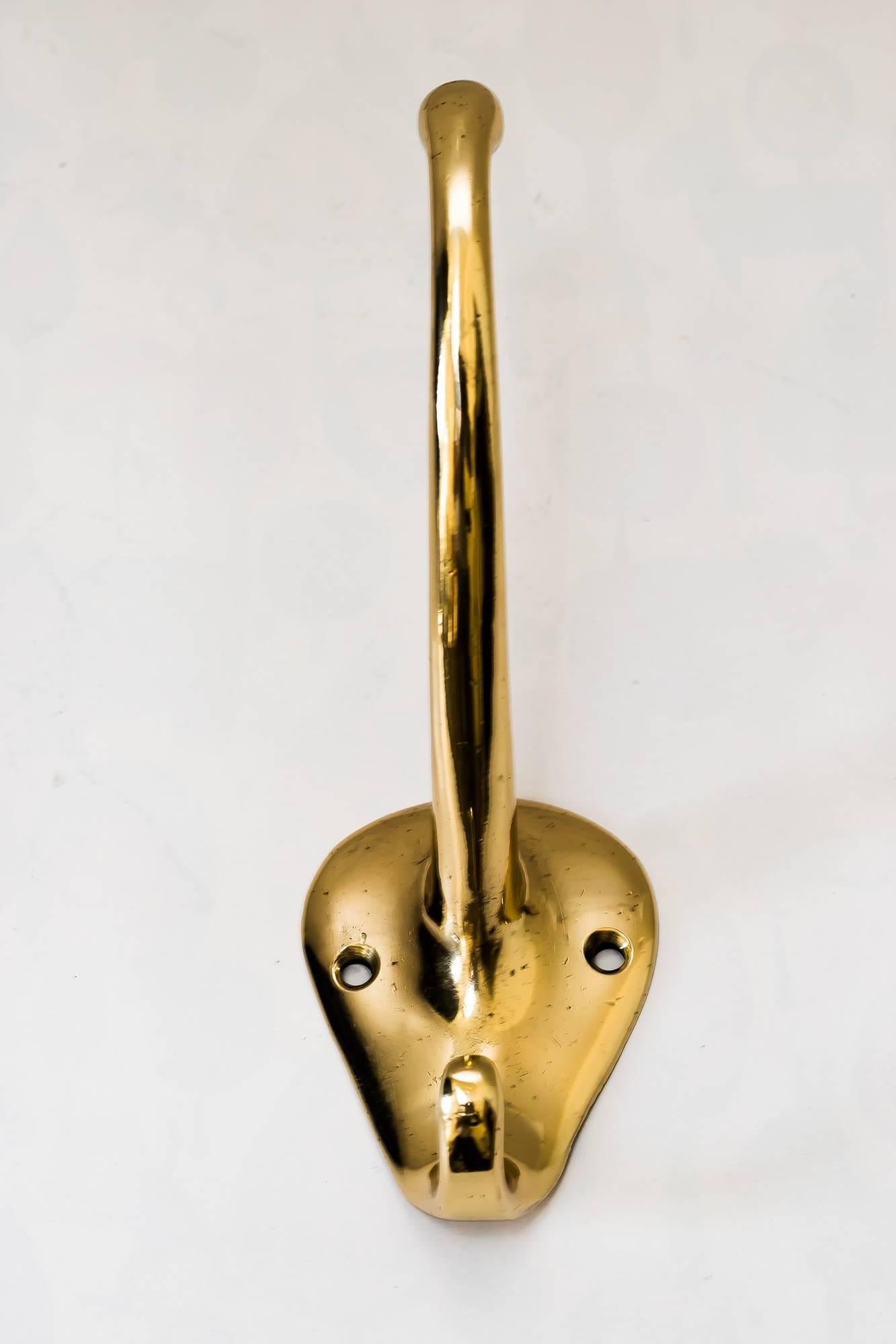 Wall hook attributed to Adolf Loos.
Polished and stove enamelled.