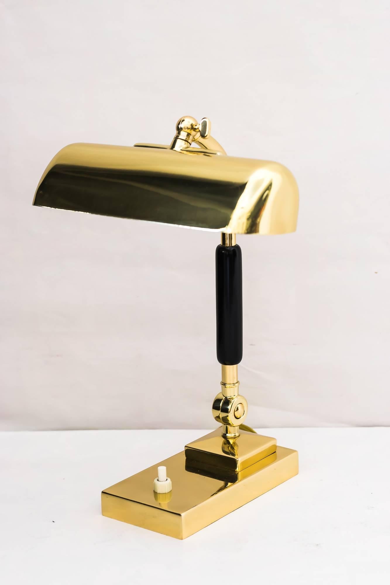 Art Deco table lamp with blackened wood, circa 1920s
apaolished and stove enamelled.