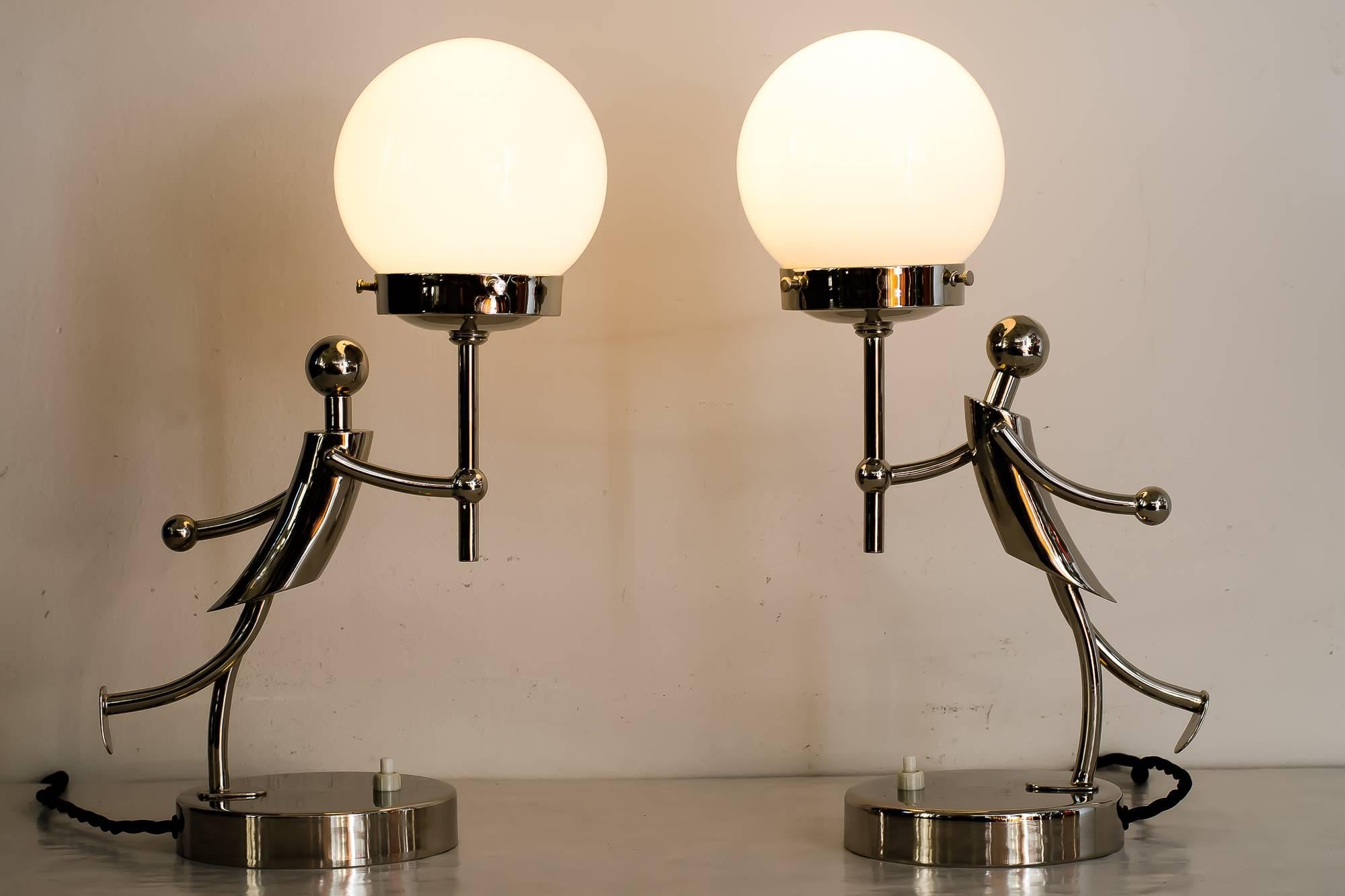 Two rare Art Deco table lamps in Hagenauer style circa 1920s 
Nickel-plated.