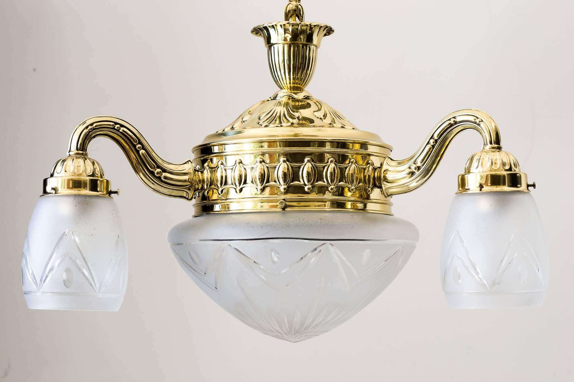 Historistic chandelier, circa 1890s
polished and stove enameled.