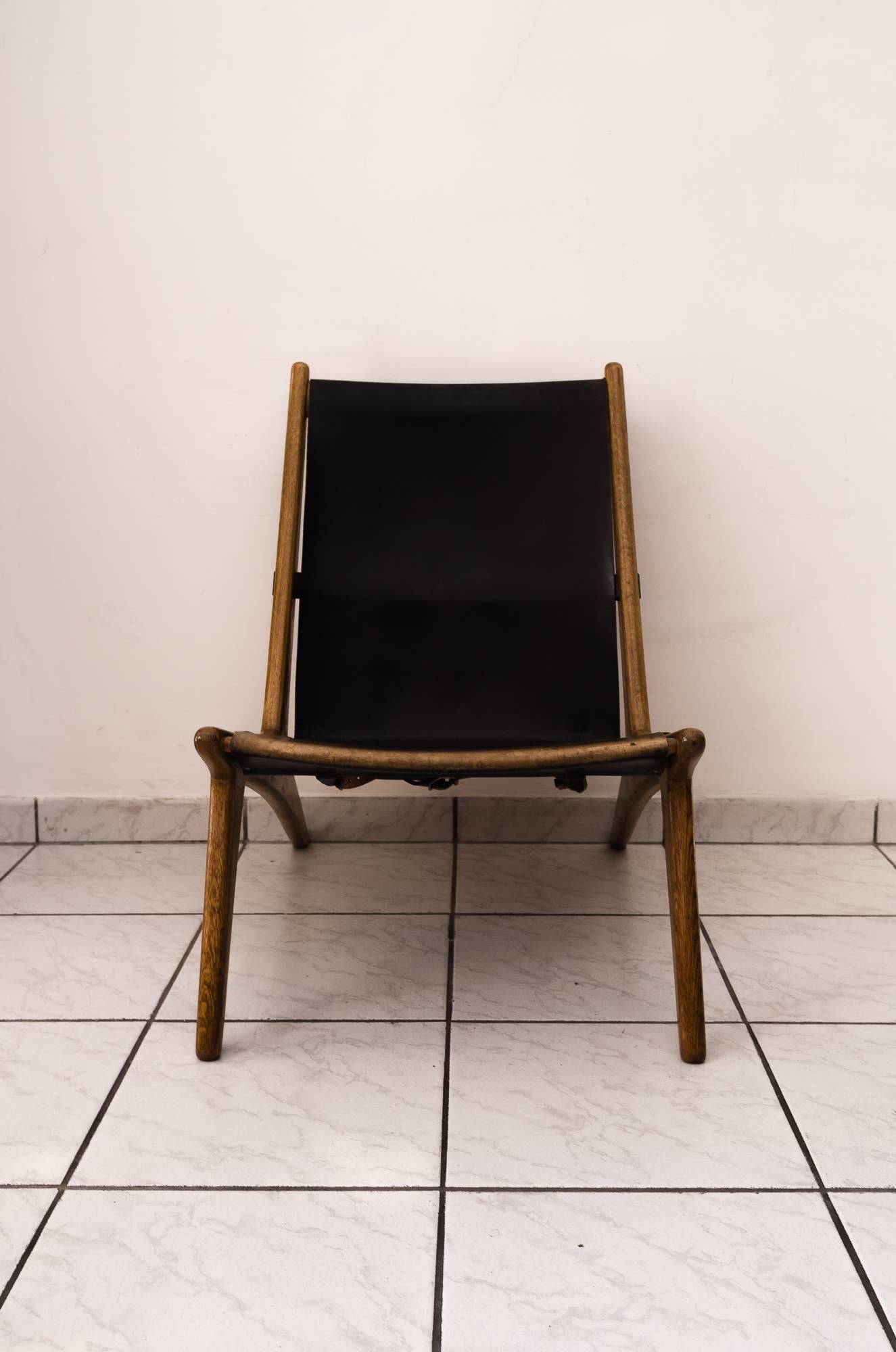 Hunting chair by Uno & Östen Kristiansson
Original condition
trace of use on the leather.