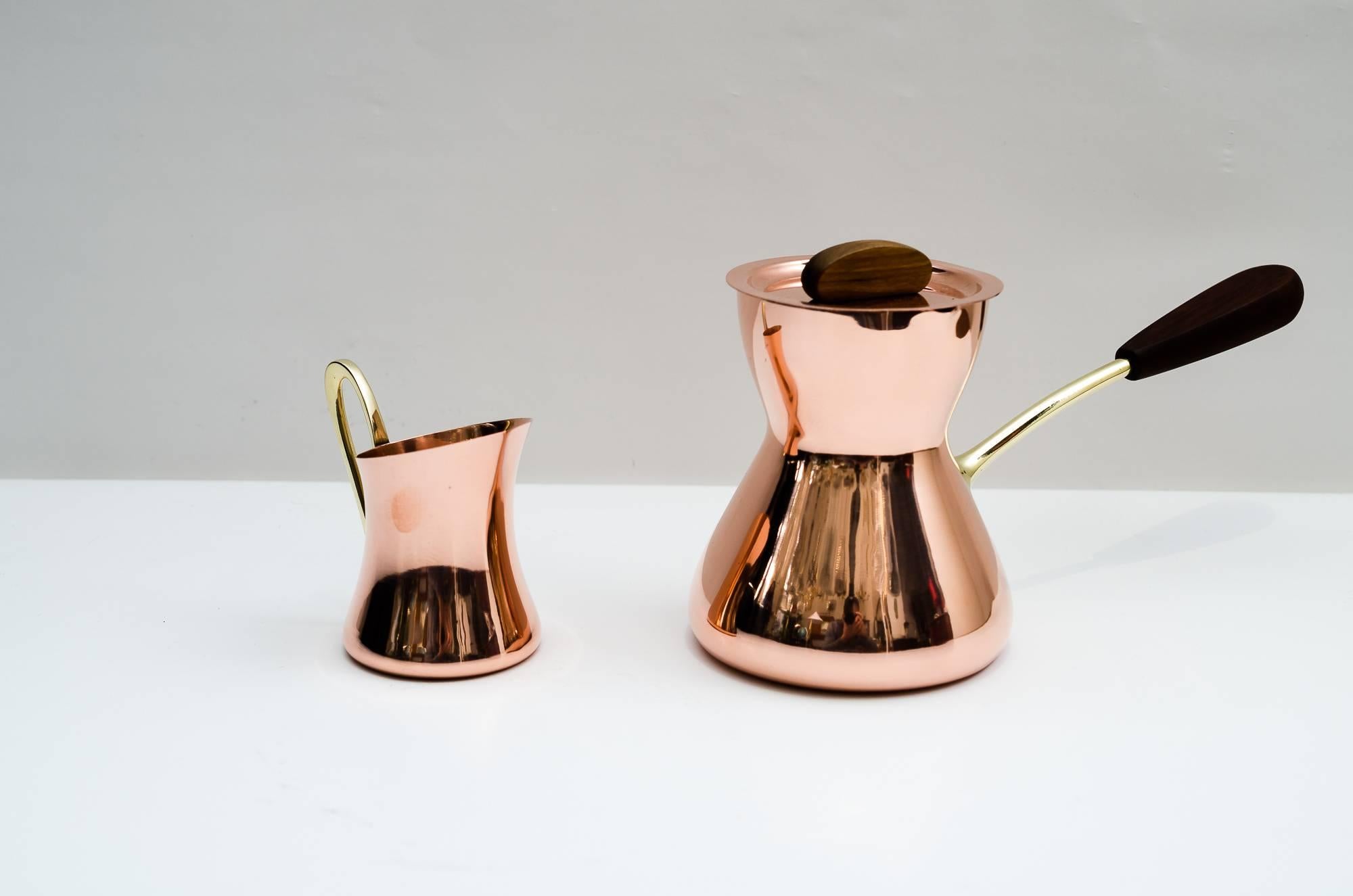 Coffee and milk can by Hagenauer
polished copper and brass.