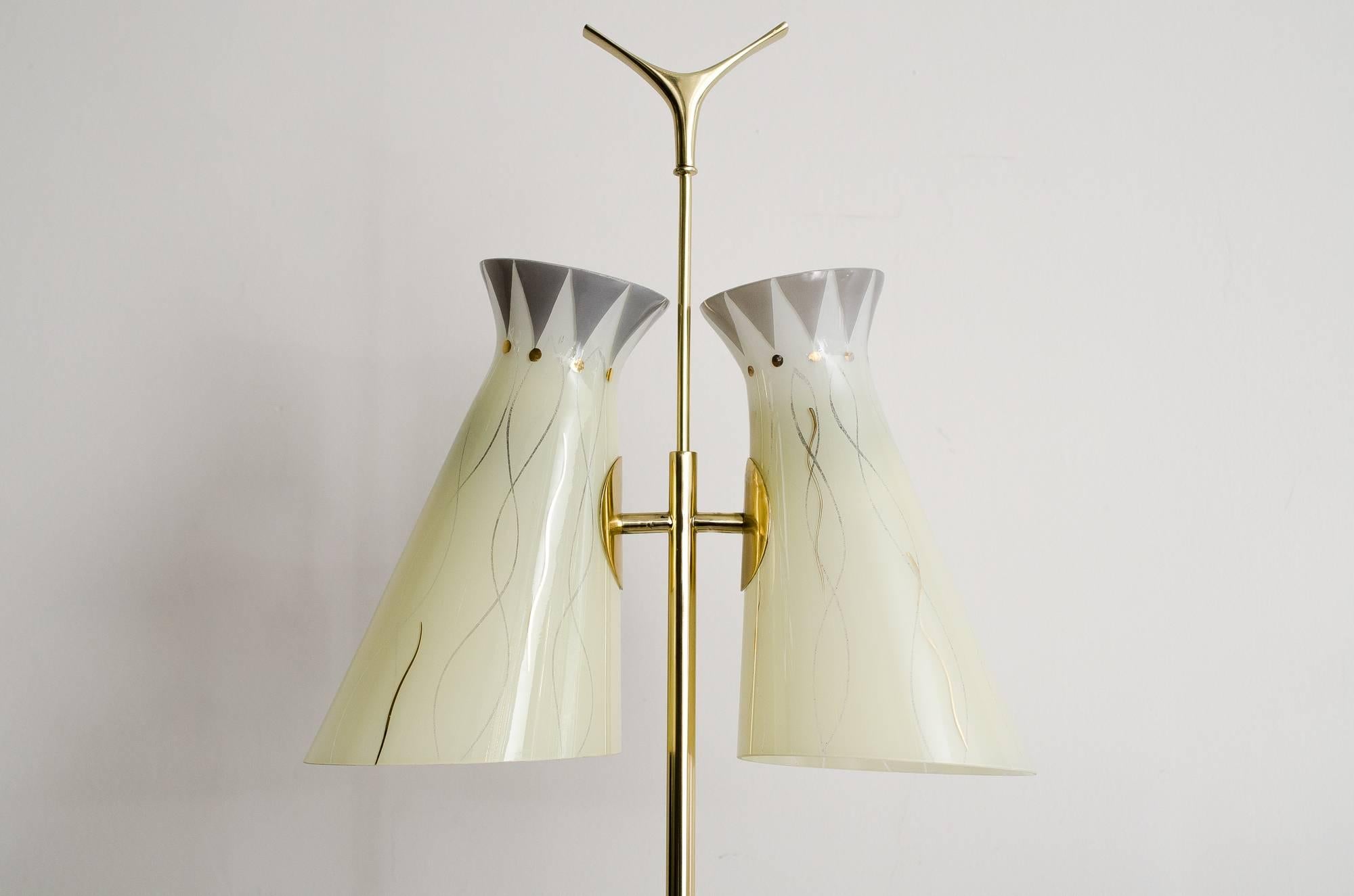 Rupert Nikoll floor lamp with original glass shades
polished and stove enameled.