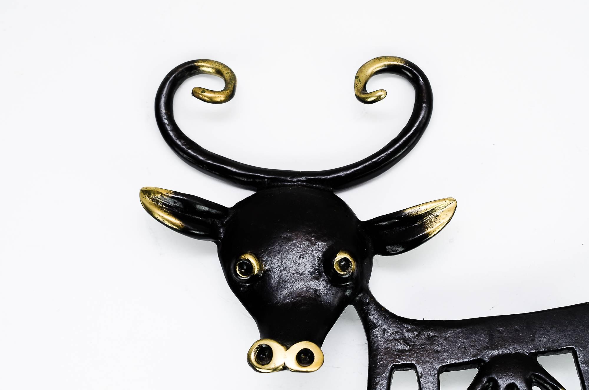 L'appendiabiti Walter Bosse che mostra una mucca, anni '50 circa.
Condizioni originali molto belle.