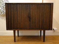Small Cabinet of Nutwood with Tambour Doors