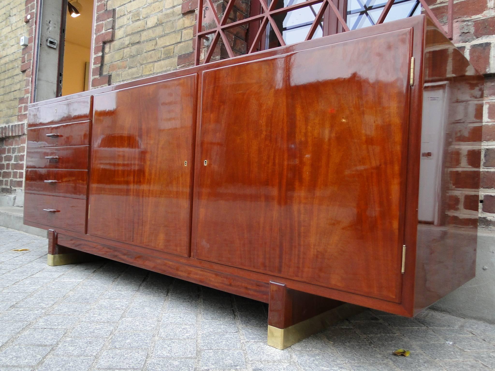 Mid-20th Century Agner Christoffersen Cuban Mahogany Sideboard Whit Brass Shoes For Sale