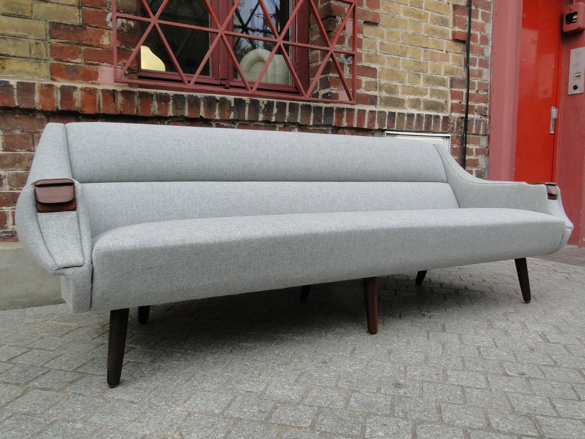 Beautiful rosewood armrests sofa from H.W. Klein, freshly upholstered in high quality fabric Kvadrat Tonica.