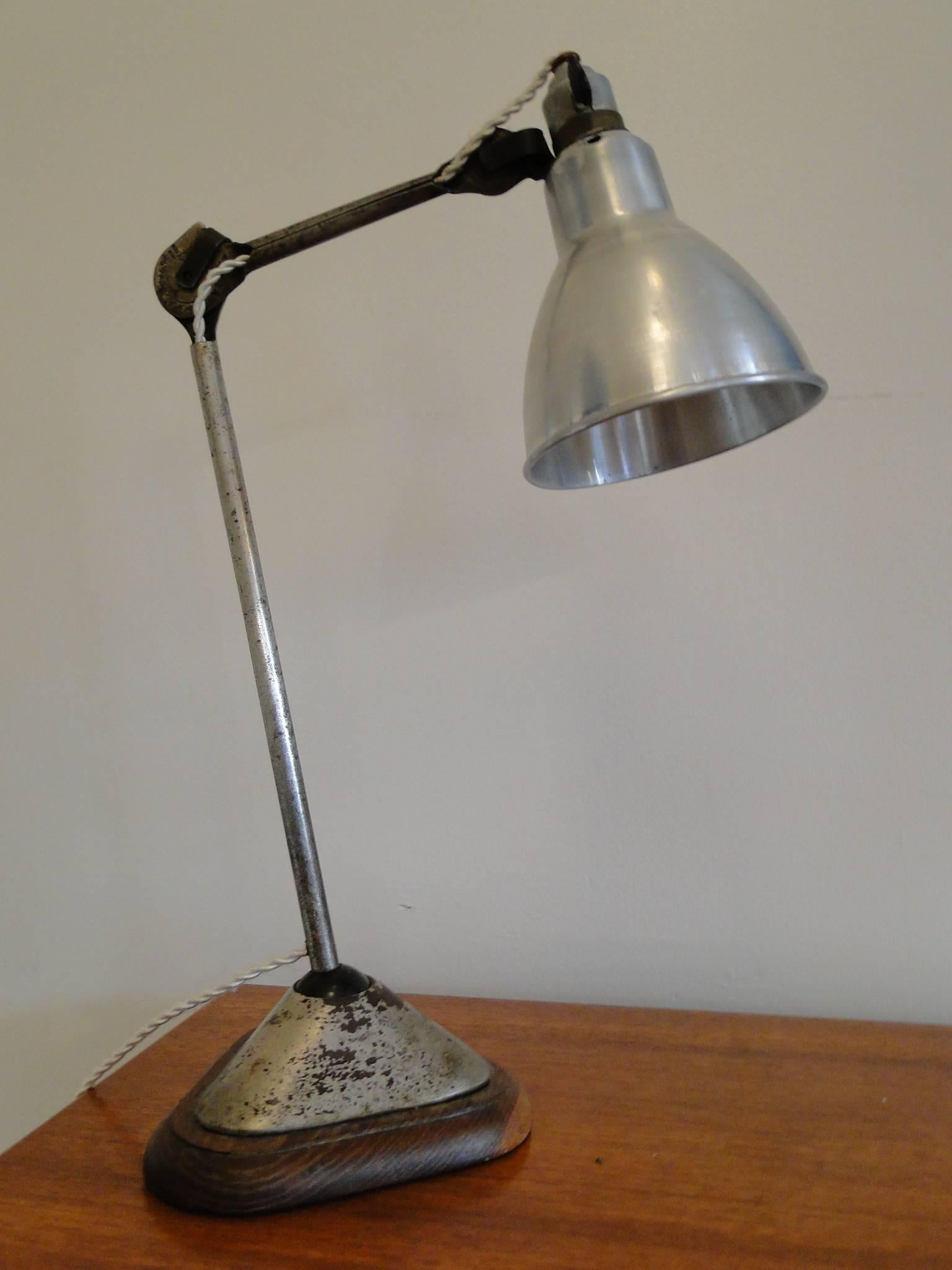 This specific lamp on sale was hand-picked in the north of France, this is the 206 model which was manufactured in the late 1930s and absolutely all parts and hardware are genuine.
The lamp was carefully restored and checked, it is fully functional