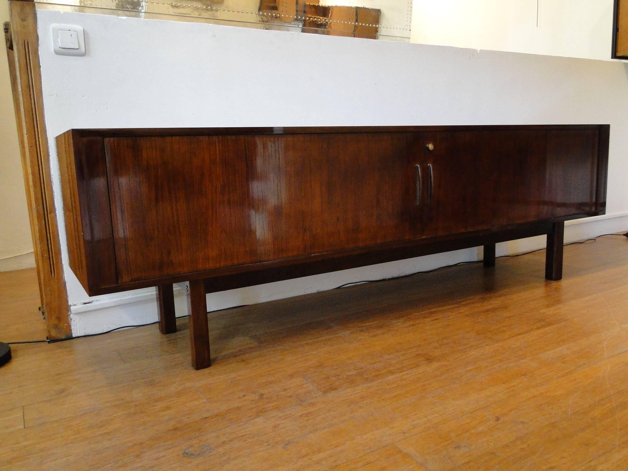 Brazilian rosewood tamboor door sideboard by Arne Vodder.

The back is also finished with Brazilian rosewood.
203 cm long.