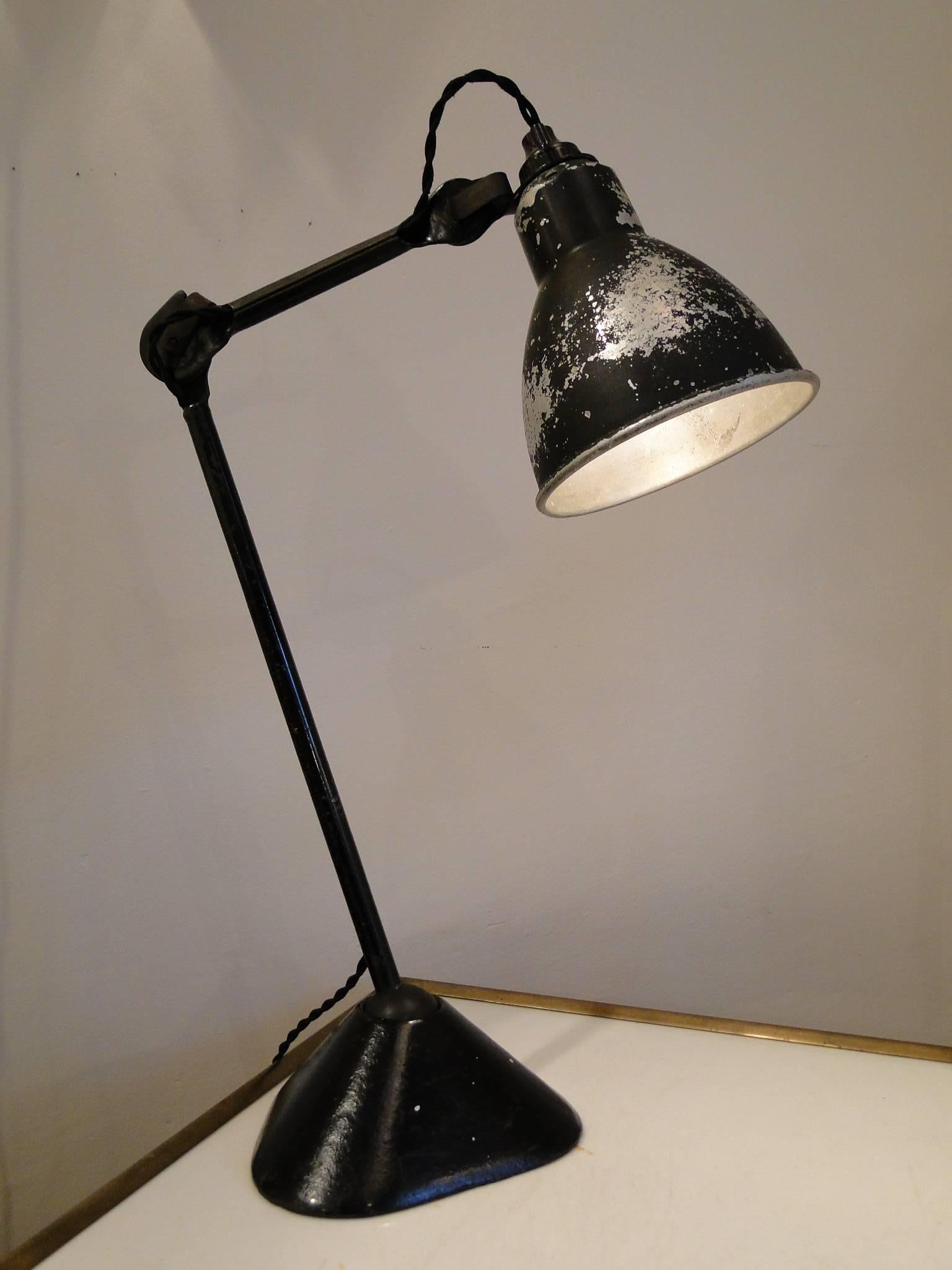 Table lamp designed by Bernard-Albin gras model 205 with aluminium shade model 1054. Marked Ravel Clamart. The Lampe Gras were selected by Le Corbusier in his studio and its projects.