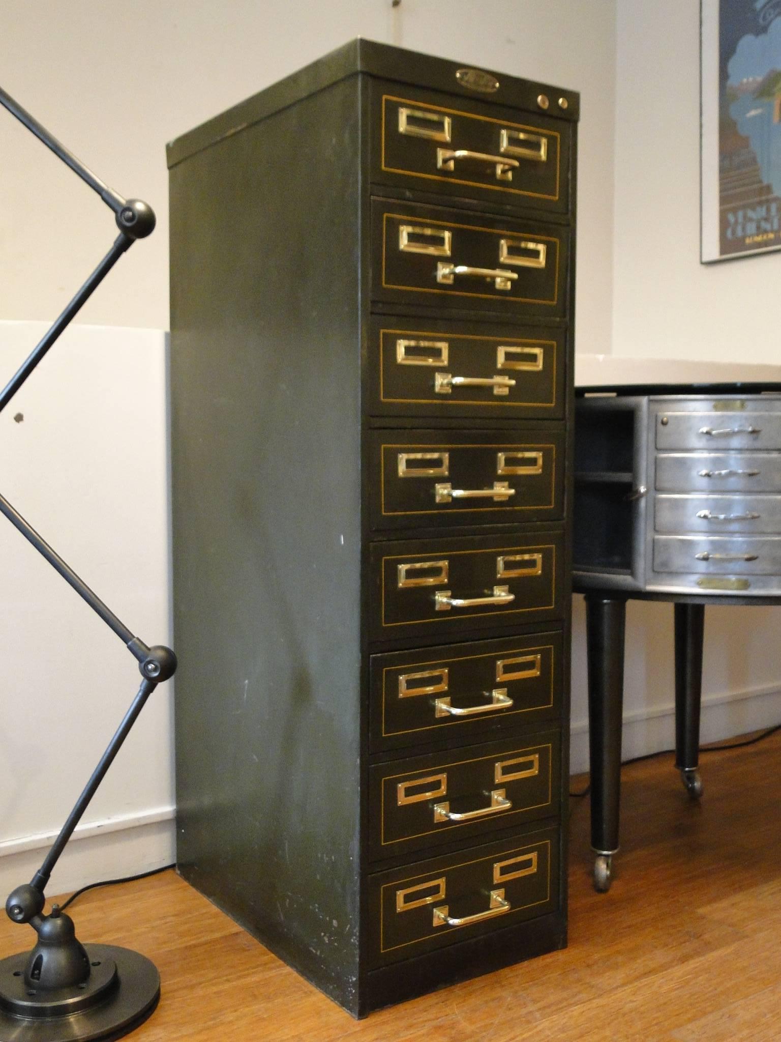 One of a kind metal case with eight drawers. A steel case furniture originating from the Industrial Revolution in French. Rare, in great functioning condition, featuring the original metal emblem of manufacture 