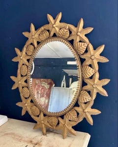 Spanish Colonial Sunburst Style Gilt Floral Oval Mirror