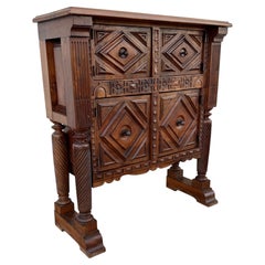 Rare Spanish Carved Walnut Sideboard with Geometric Panels and Spiral Columns