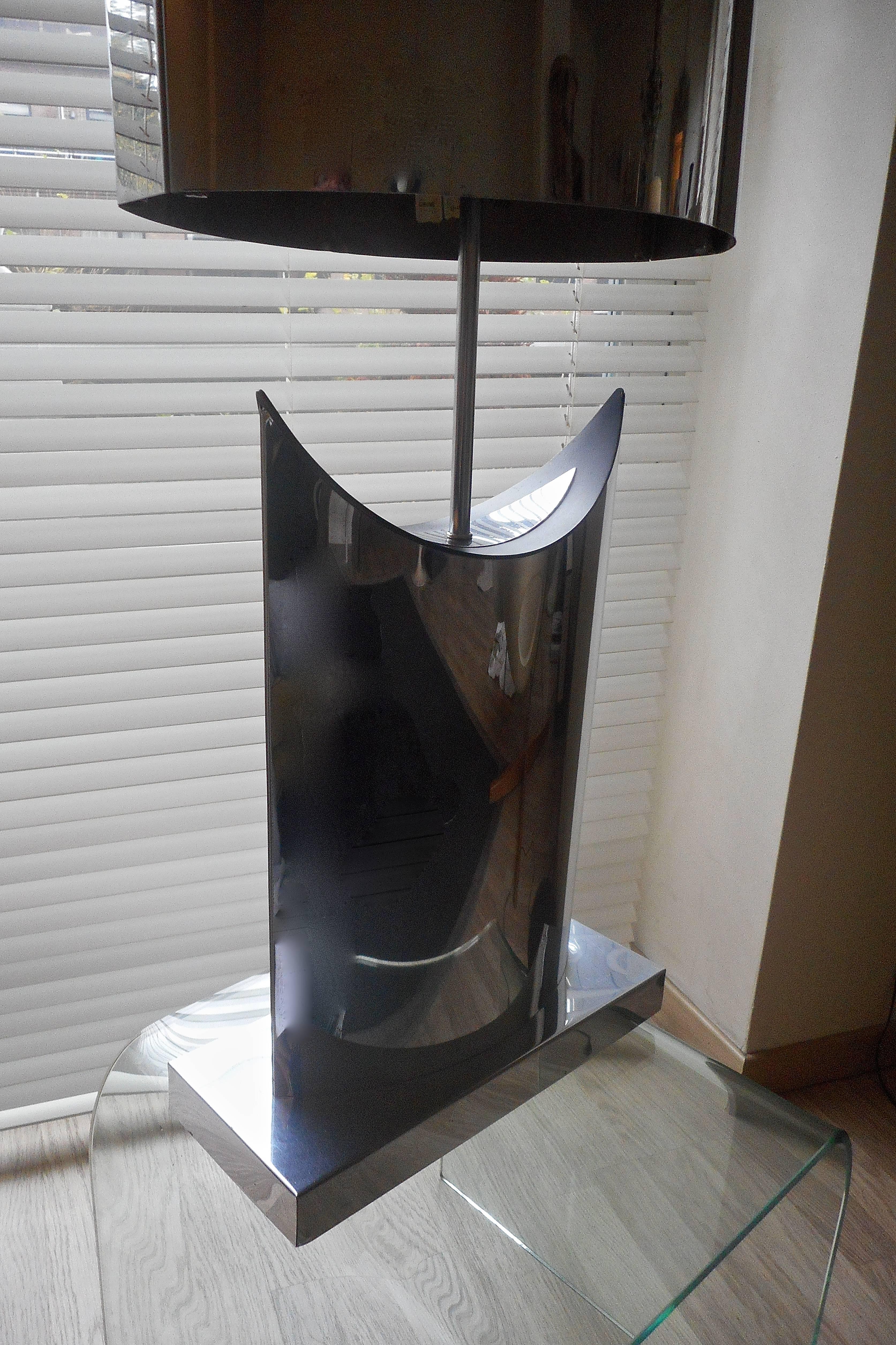Big chromed metal lamp signed and dated 1976.
One light.