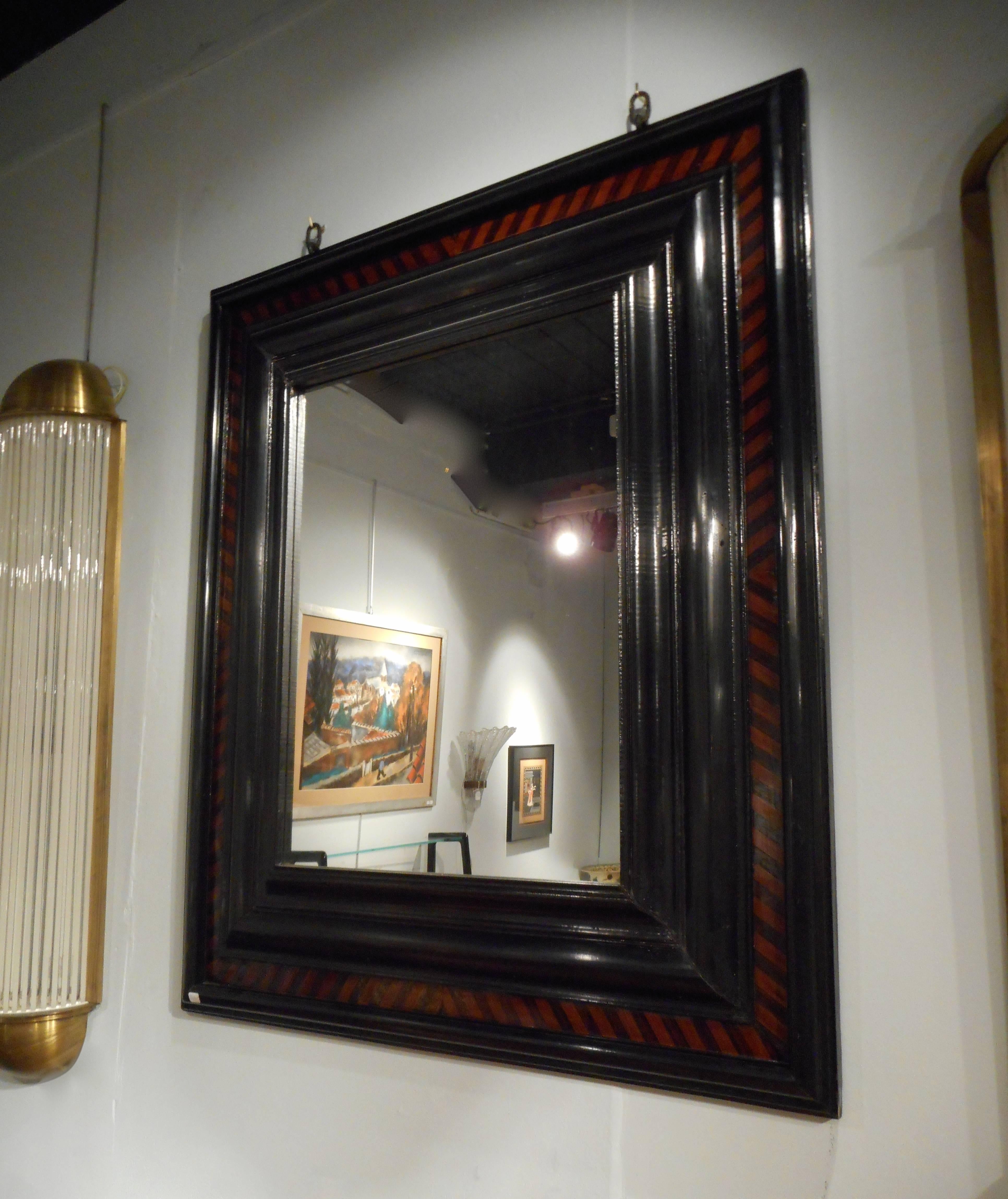 Black lacquered and parqueted veneer wood.
Second half of the 19th century.
Probably German.