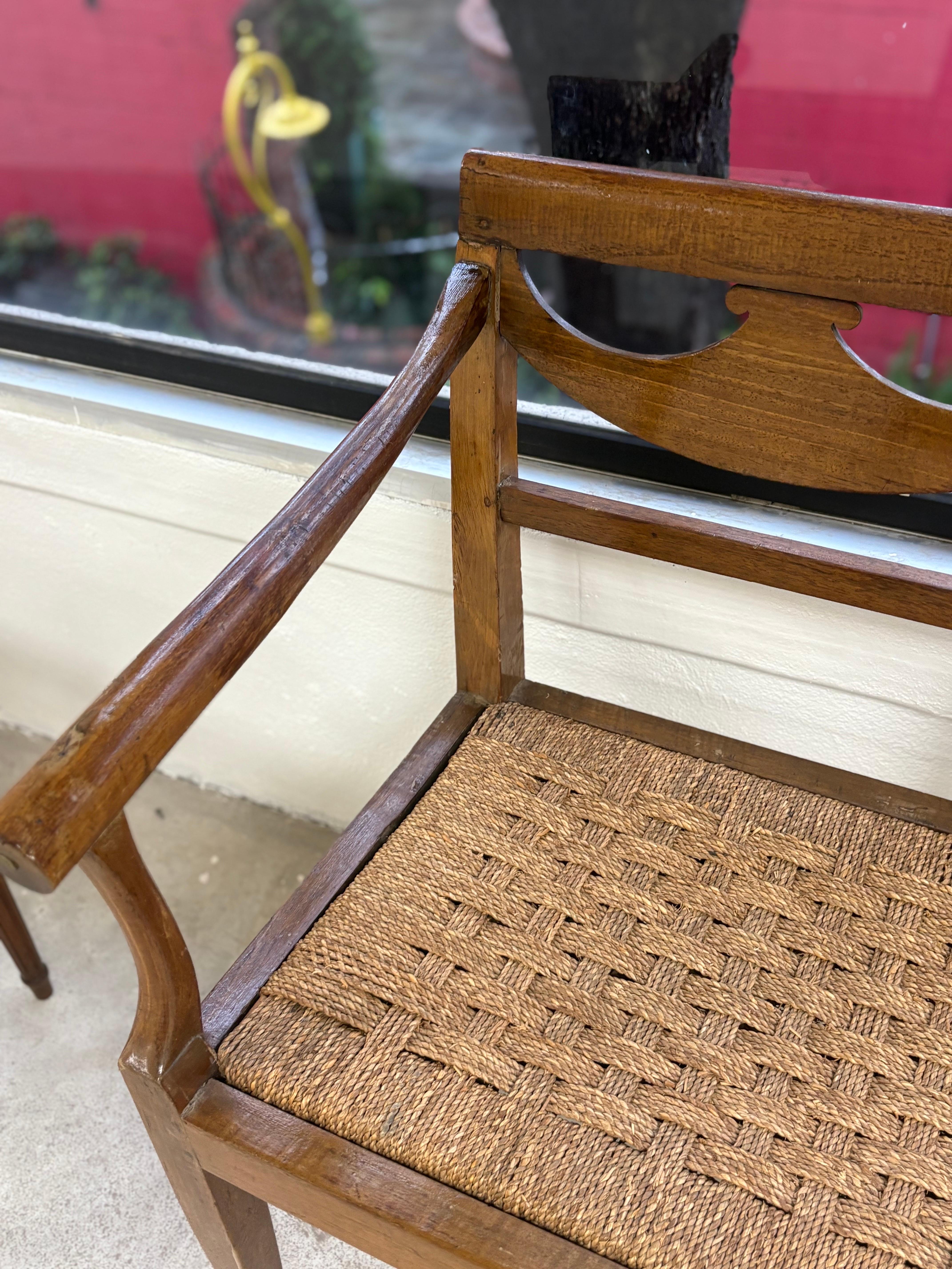 18th Century Italian Walnut Directoire Bench Having a Cord Seat and Open Arms For Sale 3