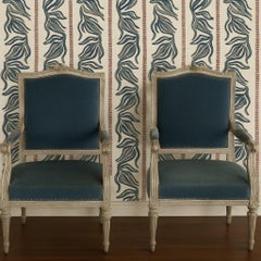 Pair of Louis XVI-style (neoclassical) French arm chairs, late 19th century