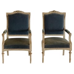 Pair of Louis XVI-style (neoclassical) French arm chairs, late 19th century