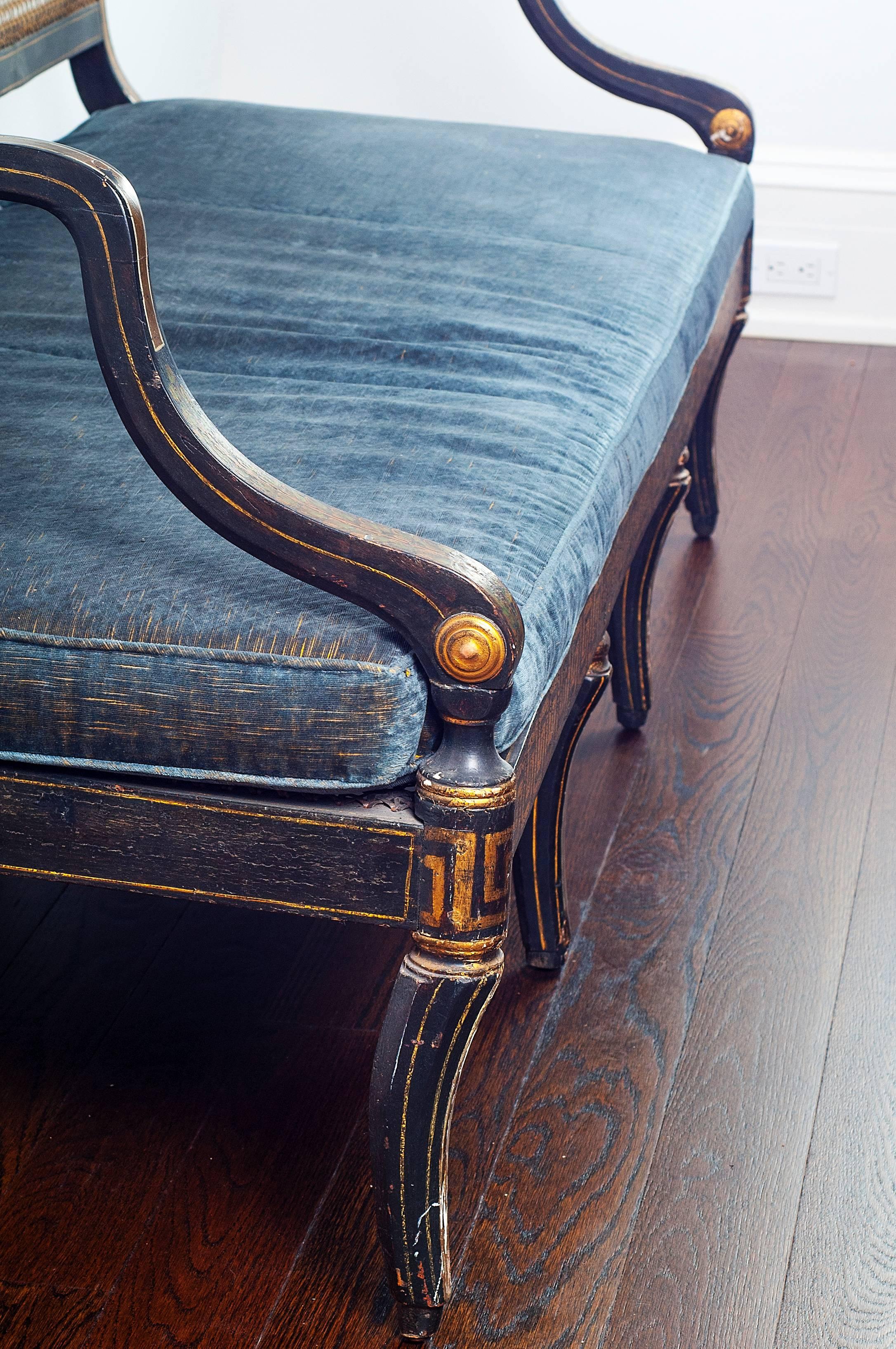 Antique Black and Gilt Painted Regency Caned Settee with Velvet Cushion 1