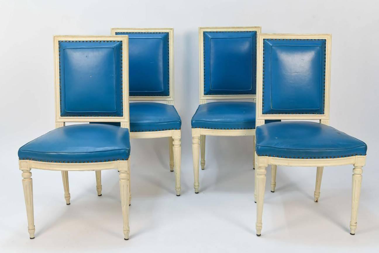 Set of vintage Louis XVI style dining chairs in turquoise leather.