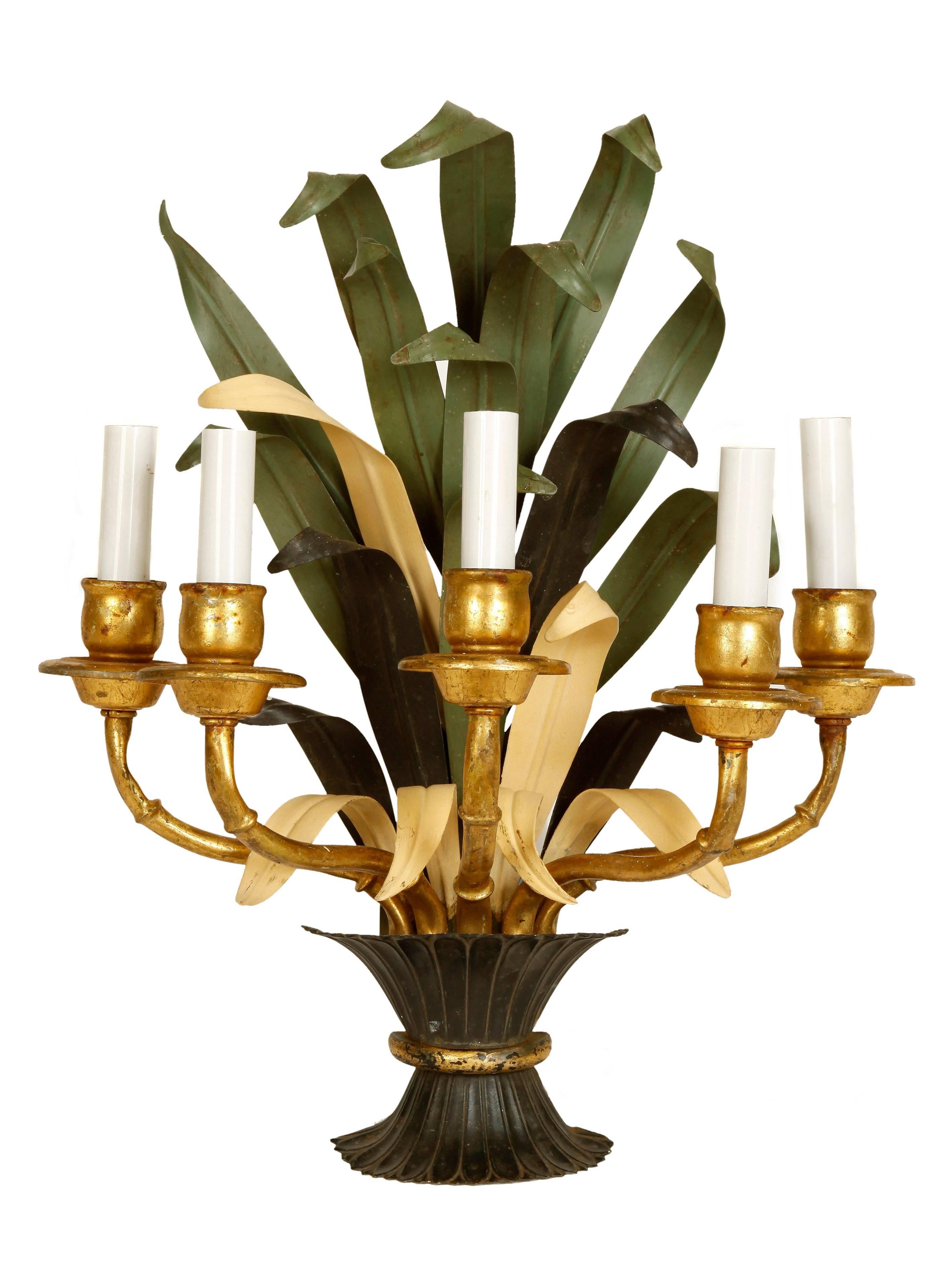 Set of four Bagues style tole French sconces. Featuring green and beige foliage, each with five gilt candles. Wired for electricity.