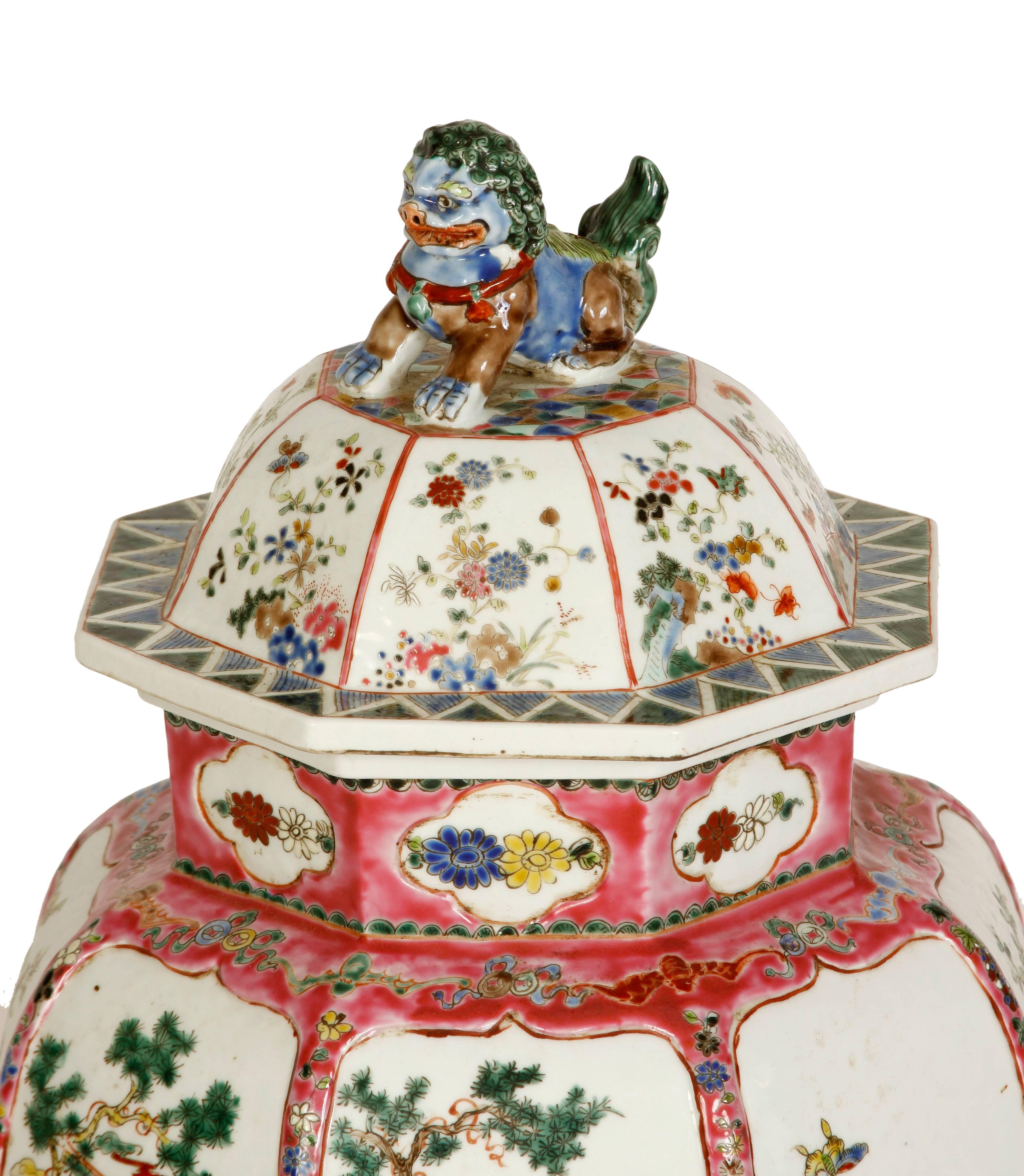 A pair of antique Chinese famille rose octagonal covered jars.