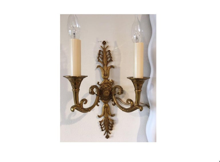 Pair of Gilt Metal Empire Two-Arm Sconces In Good Condition For Sale In Locust Valley, NY