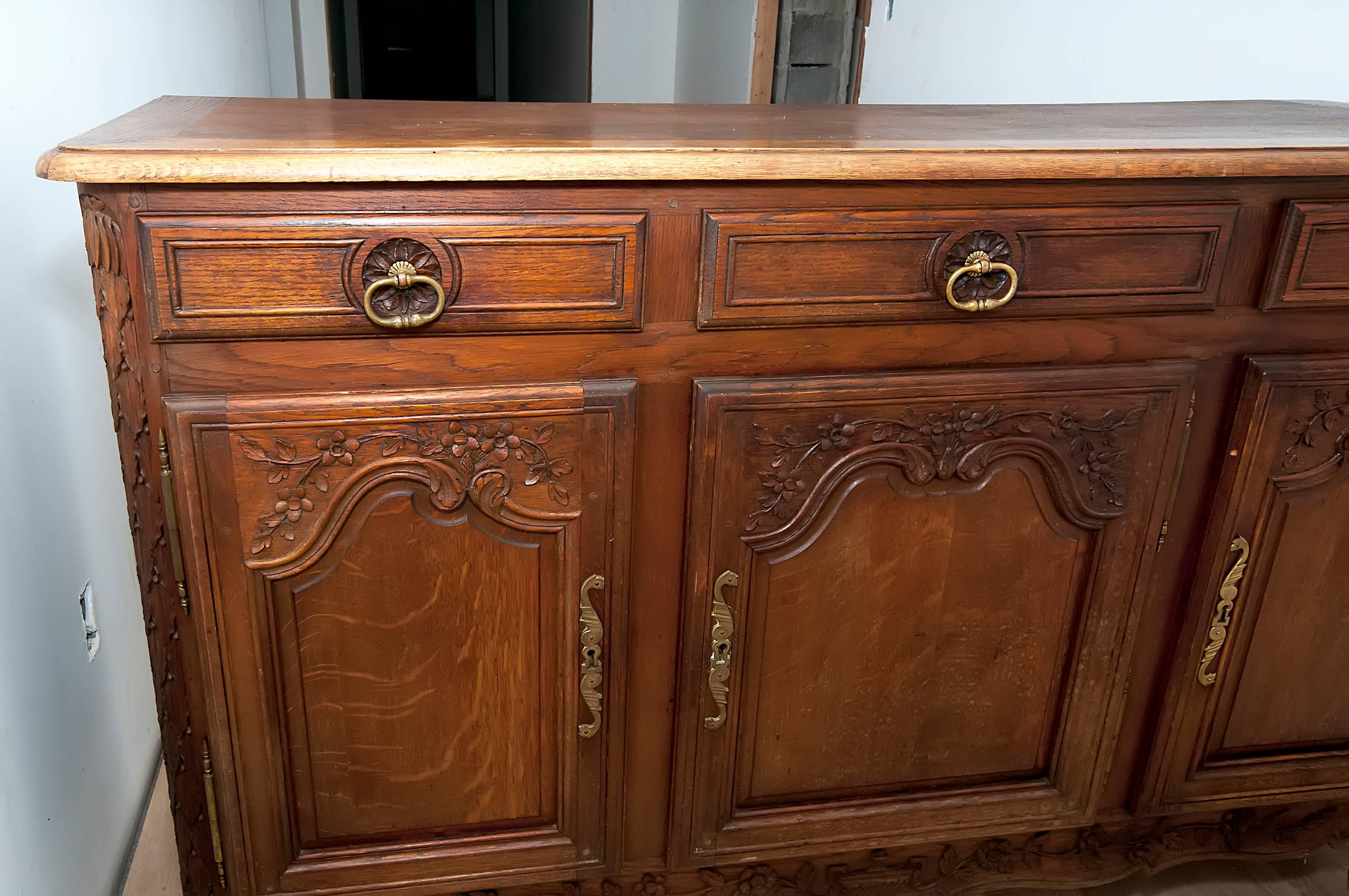 Late 19th Century French Regency Three-Door Three-Drawer Enfilade in Carved Oak In Good Condition In Locust Valley, NY