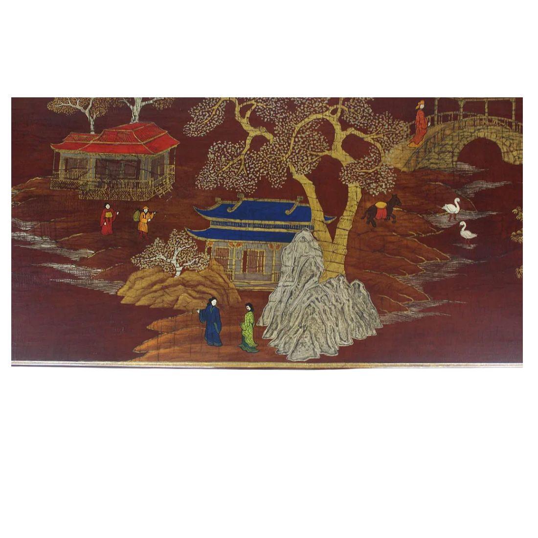 The Chinoiserie style coffee table fom the Laque de Chine Collection by John Boone is a striking example of craftsmanship and timeless decorative style. The low-profile wooden table features a richly detailed, hand-painted Asian scene across the top