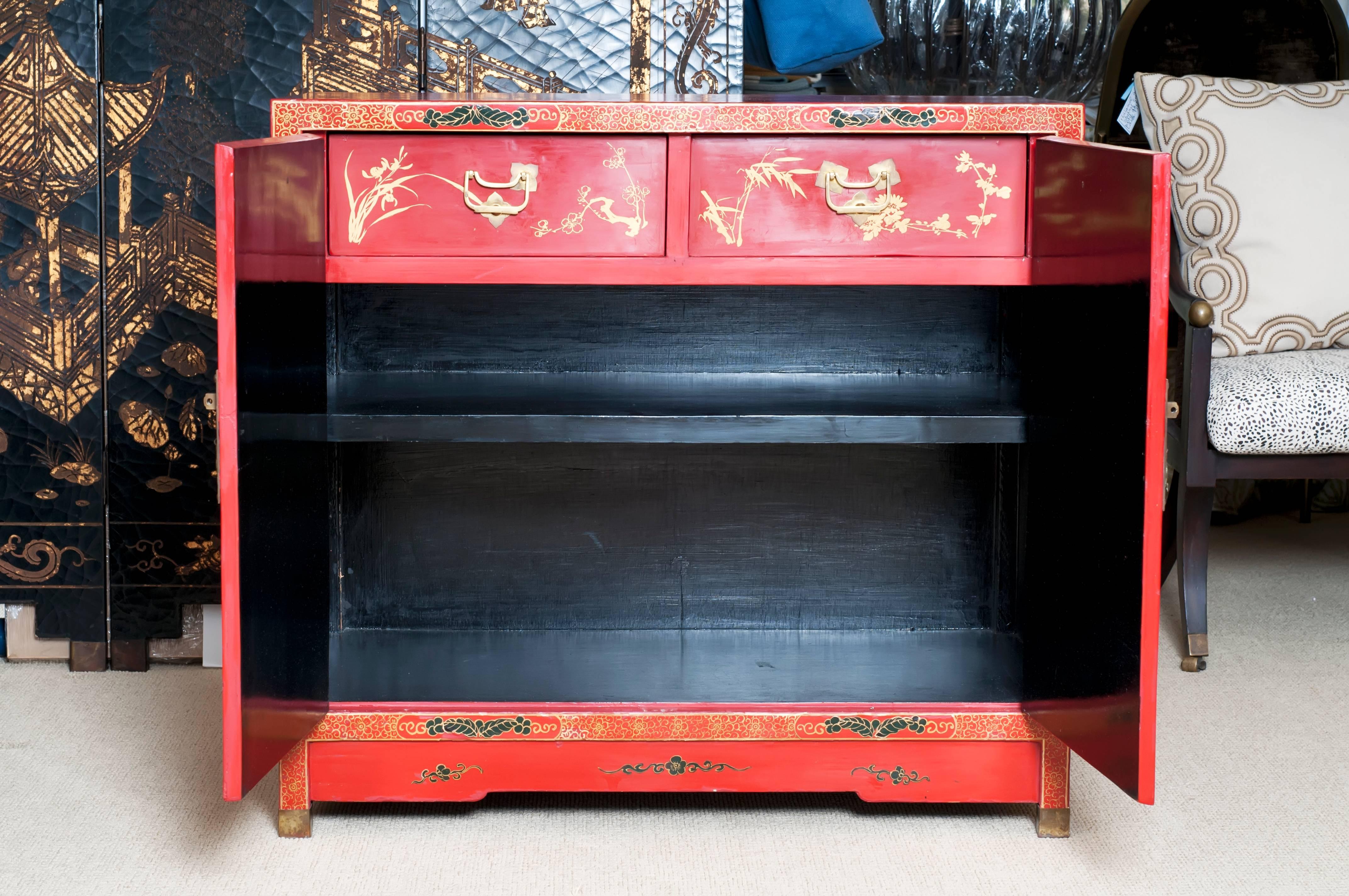 Vintage Asian red lacquered cabinet.