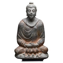 Gandharan Stucco Figure of the Seated Buddha, 3rd Century AD