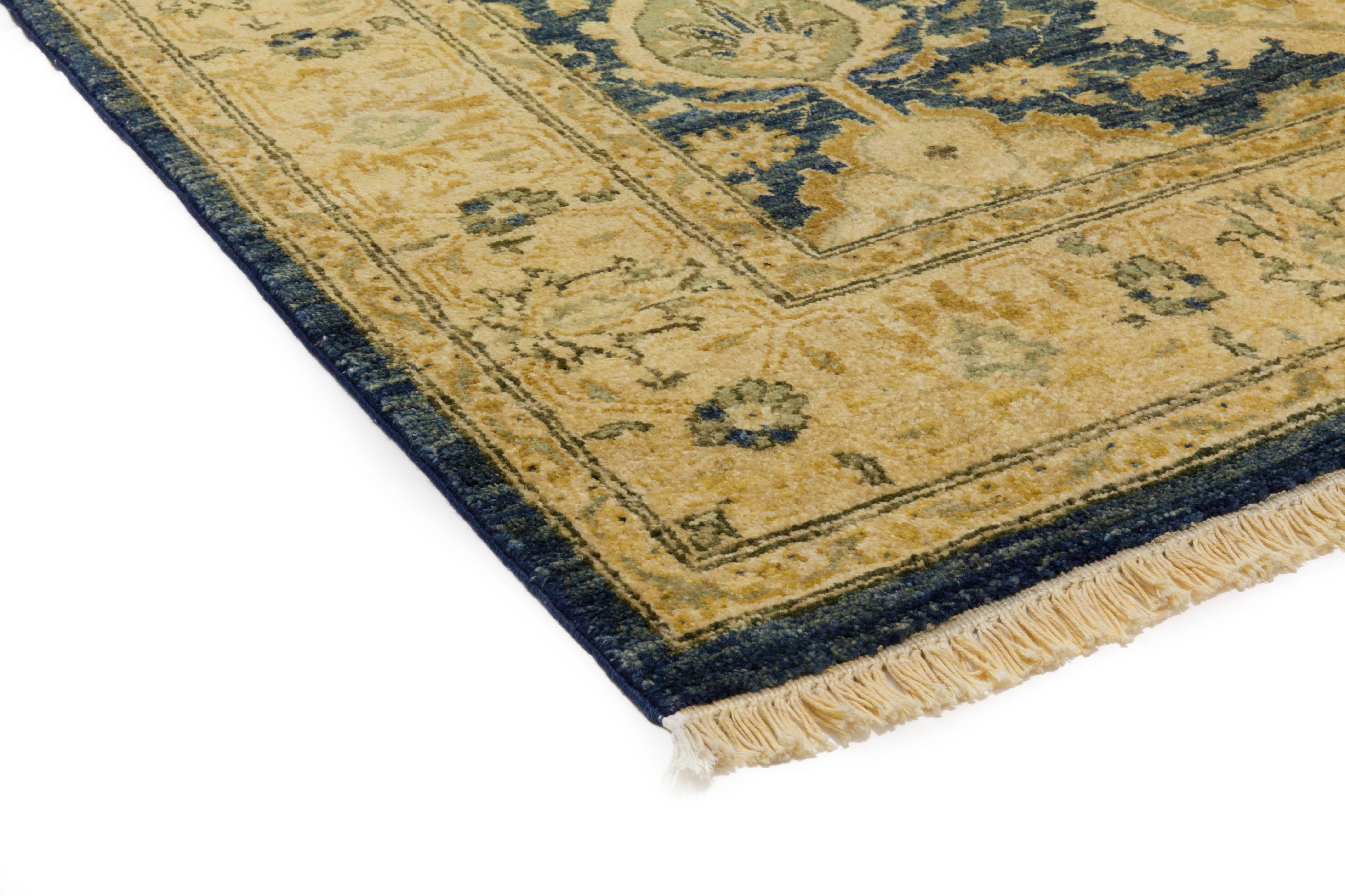 Color: Blue - Made In: Pakistan. 100% Wool. Originating centuries ago in what is now Turkey, Oushak rugs have long been sought after for their intricate patterns, lush yet subtle colors, and soft luster. These rugs continue that tradition.