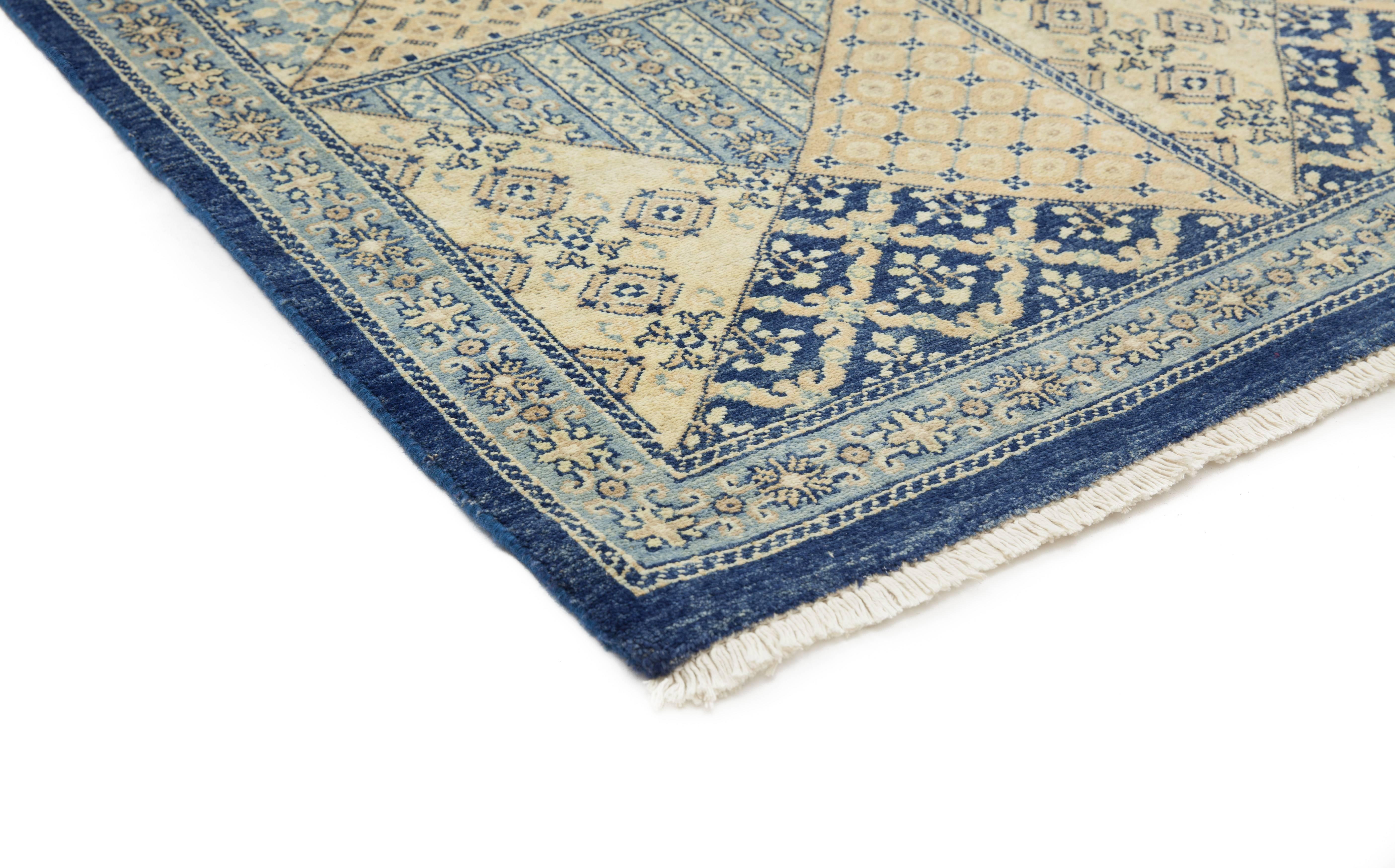Color: Green - Made In: Pakistan. 100% Wool. Persian rug-making at its finest inspired the rich colors, elaborate geometric motifs, and botanical detailing of the Serapi collection. With as many as 100 knots per inch, these handcrafted rugs are as