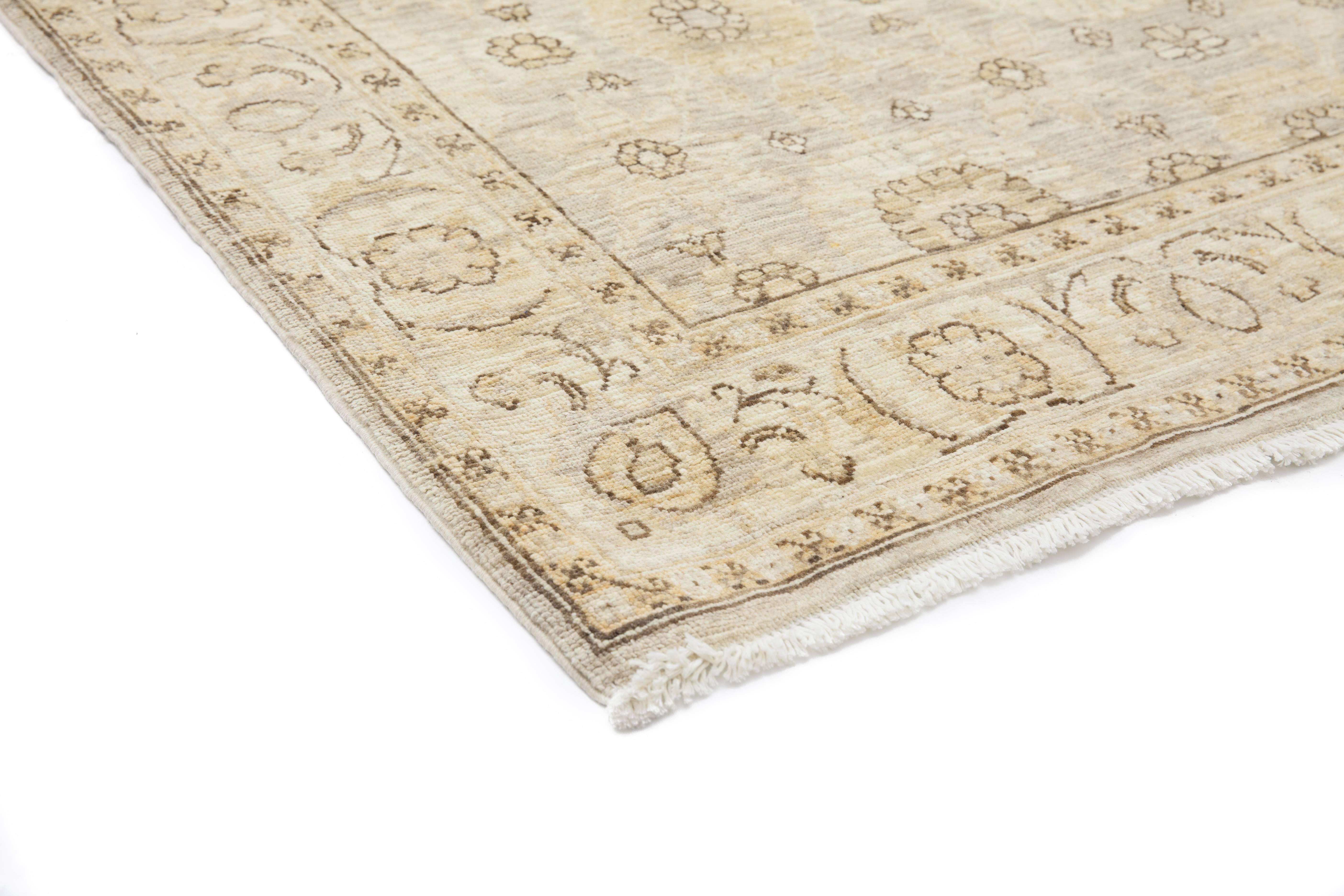 Color: Beige - Made In: Pakistan. 100% Wool. Originating centuries ago in what is now Turkey, Oushak rugs have long been sought after for their intricate patterns, lush yet subtle colors, and soft luster. These rugs continue that tradition.