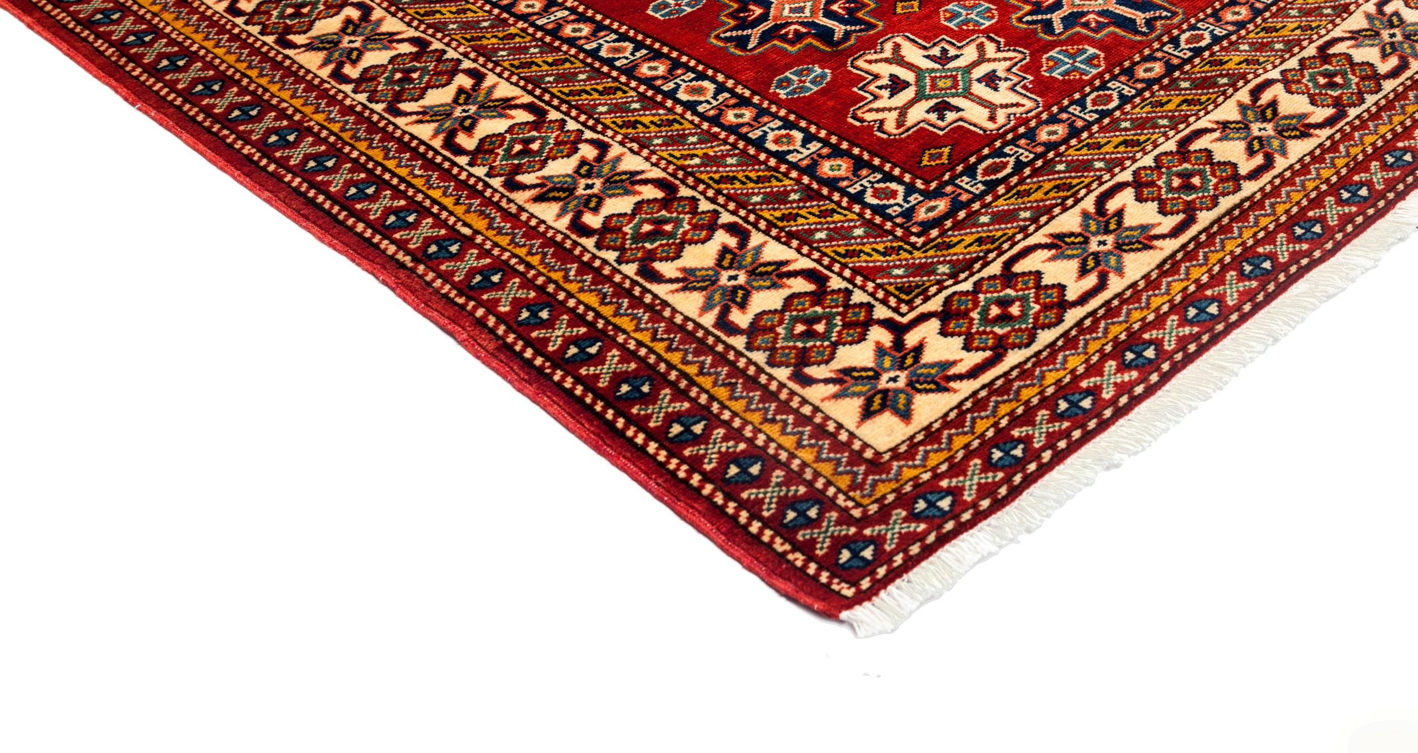 Color: Red - Made In: Pakistan. 100% Wool. With their earthy palettes and geometric patterns, the hand-knotted rugs of the Southwestern collection make beautiful additions to rustic and lodge-style rooms. At the same time, they contribute a sense of