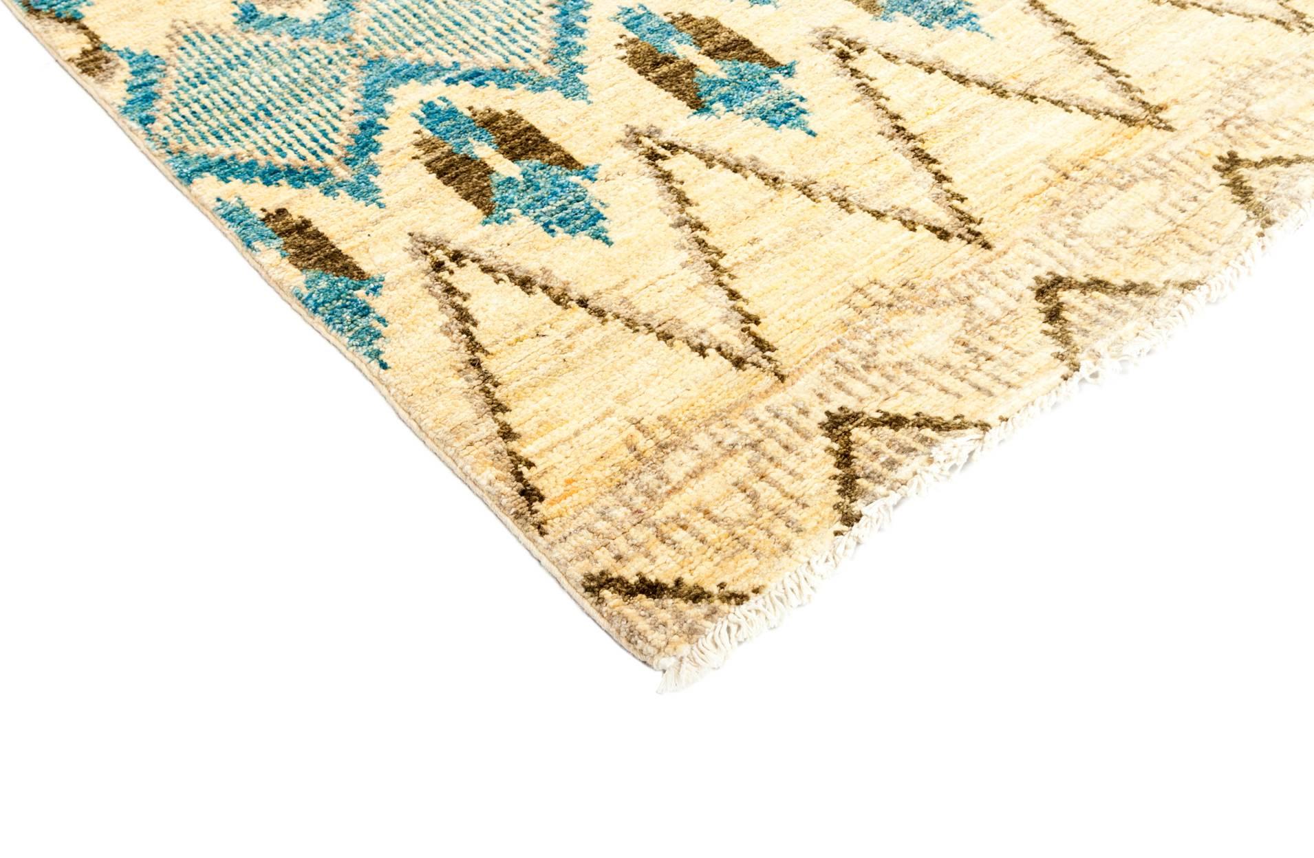 At once classic and modern, this rug is inspired by central Asian and Uzbek silk Ikats and reimagined in vivid colors. Hand-knotted and vegetable-dyed, the wool rug is designed to refresh a room for generations to come.