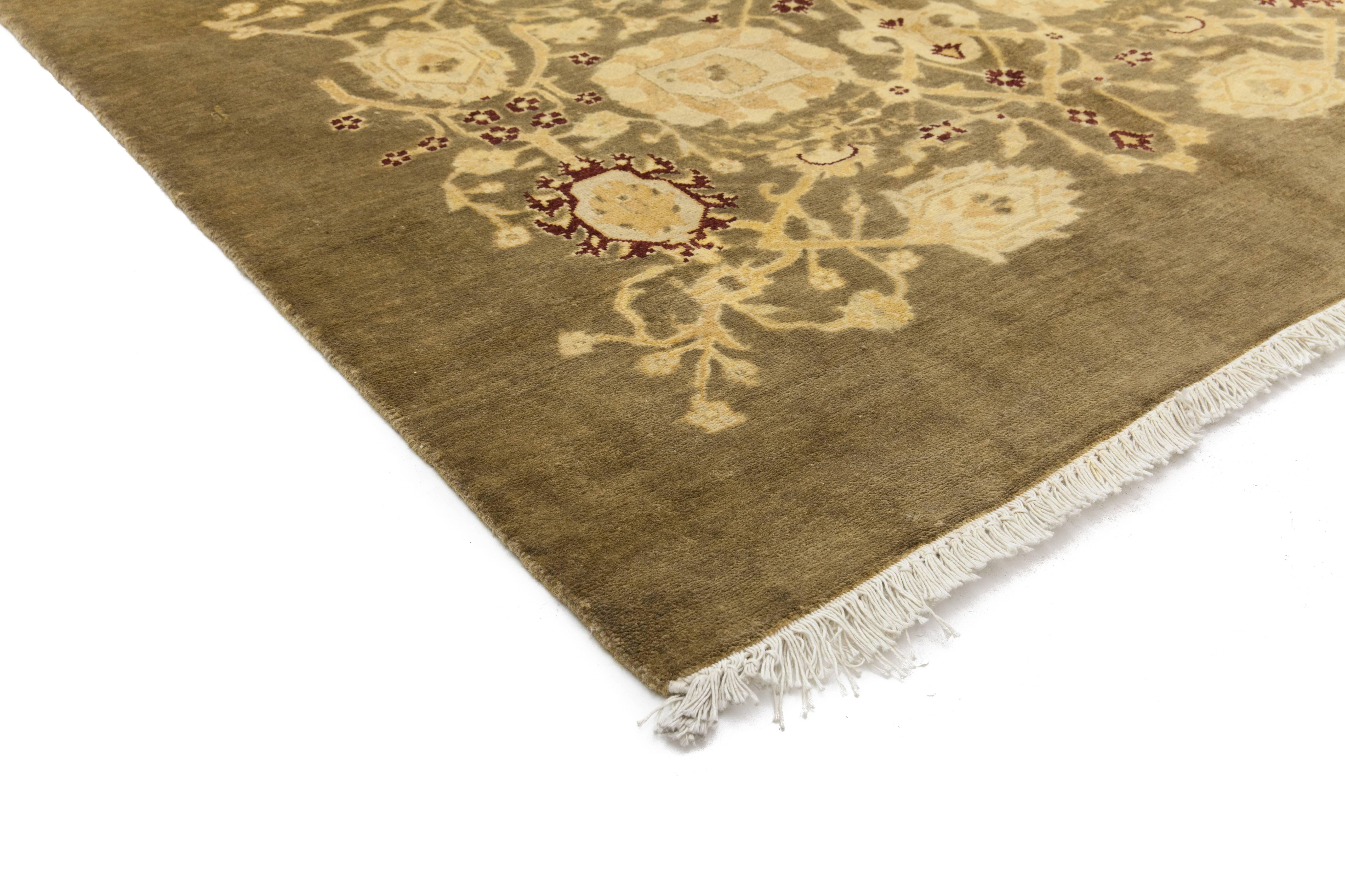 Color: Brown - Made In: Pakistan. 100% Wool. Originating centuries ago in what is now Turkey, Oushak rugs have long been sought after for their intricate patterns, lush yet subtle colors, and soft luster. These rugs continue that tradition.