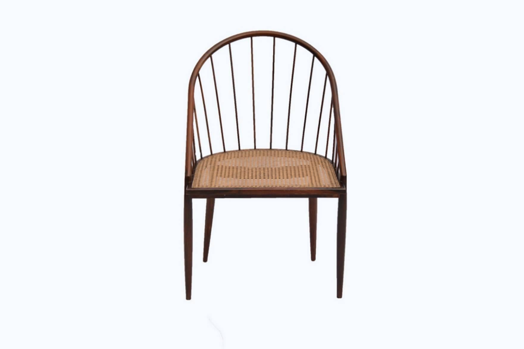 Set of 12 original curved chairs in Jacaranda wood and caned D-shape seating.