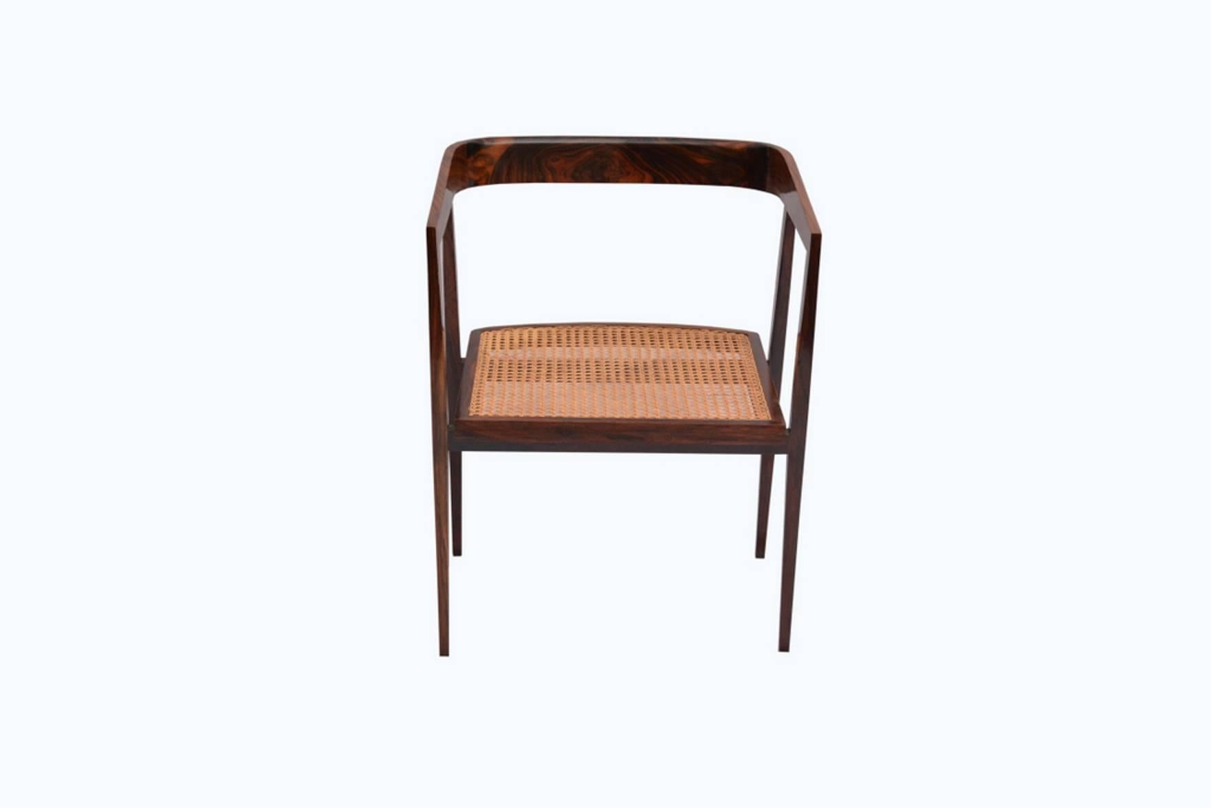 Original Joaquim Tenreiro armchairs, produced in 1960 in Jacaranda wood and caned seat. With age appropriate wear. It can be bought in sets of 4 units or total of 8 units.