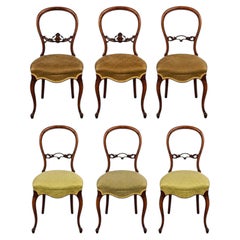 Set of Six Harlequin French Napoleon III Walnut Balloon-Back Salon Chairs, 1860s