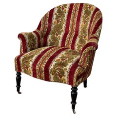Sillón «crapaud» francés de terciopelo a rayas con motivos florales, de la época de Napoleón III (década de 1870)