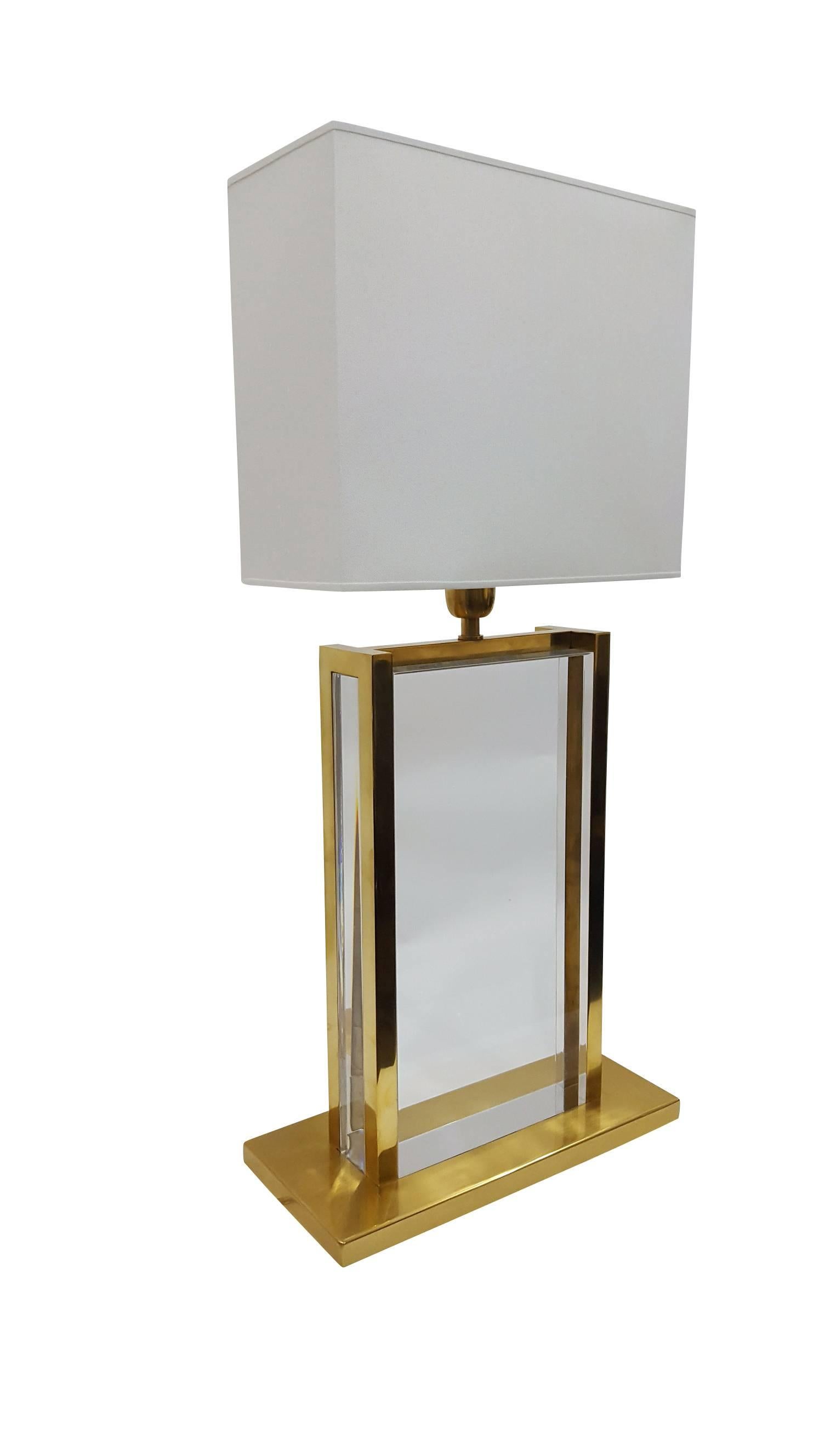 Stunning Mies corners table lamp in brass and acrylic by Michael Dawkins.