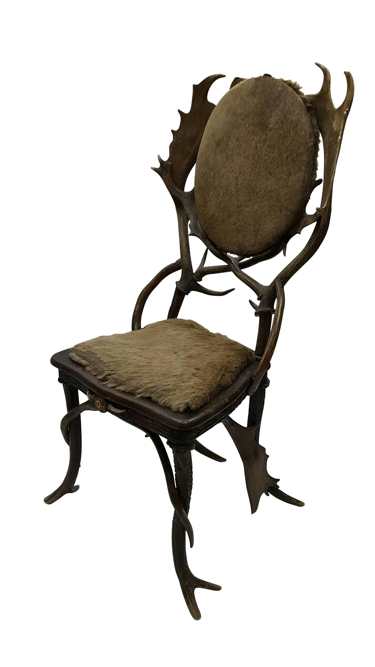 Gorgeous 19th century vintage antler chair 
Dimensions:
22"D x 23" W x 44" H
Sit 14.5" depth x 18" width 
One of the kind piece.