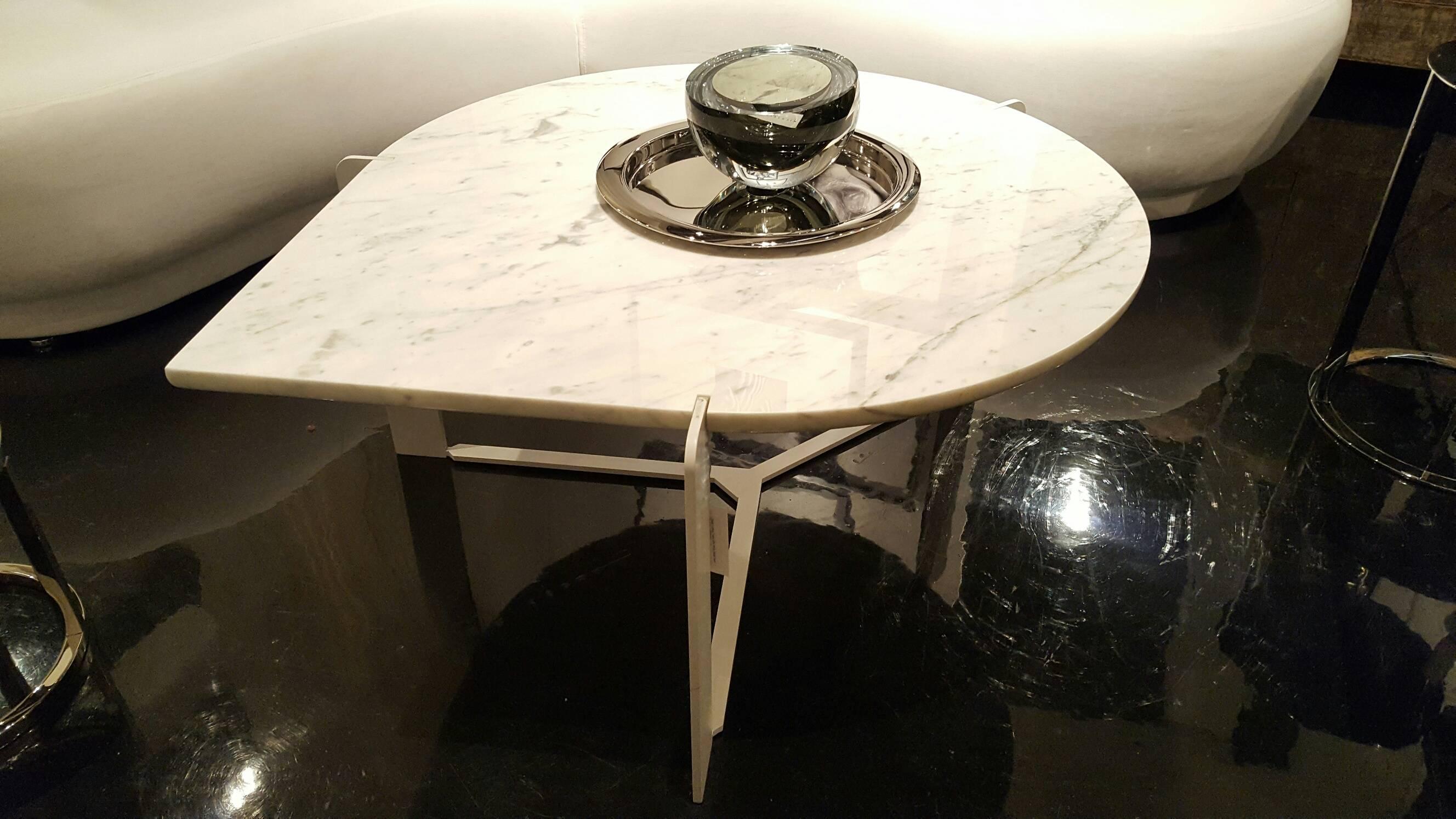 Beautiful bead coffee table with white metal base
and Carrara marble top
Measures: 36" diameter x 18" height.