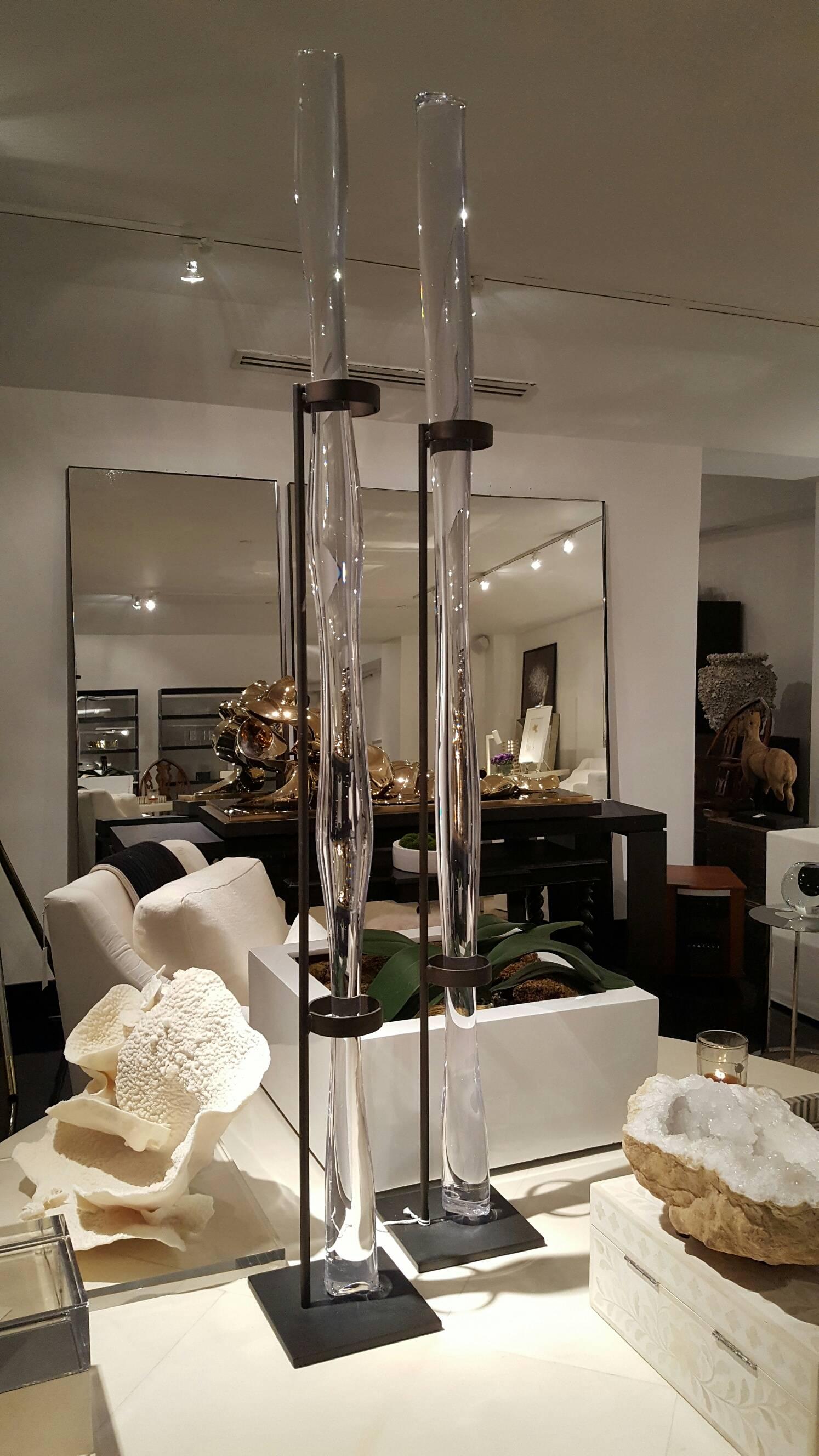 Beautiful crystal rod on vertical stand.
