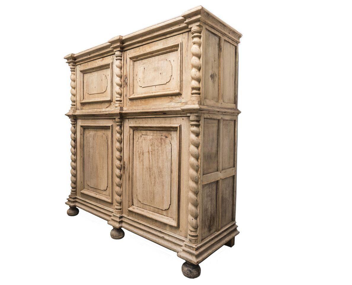 Gorgeous antique wood four-door cabinet.