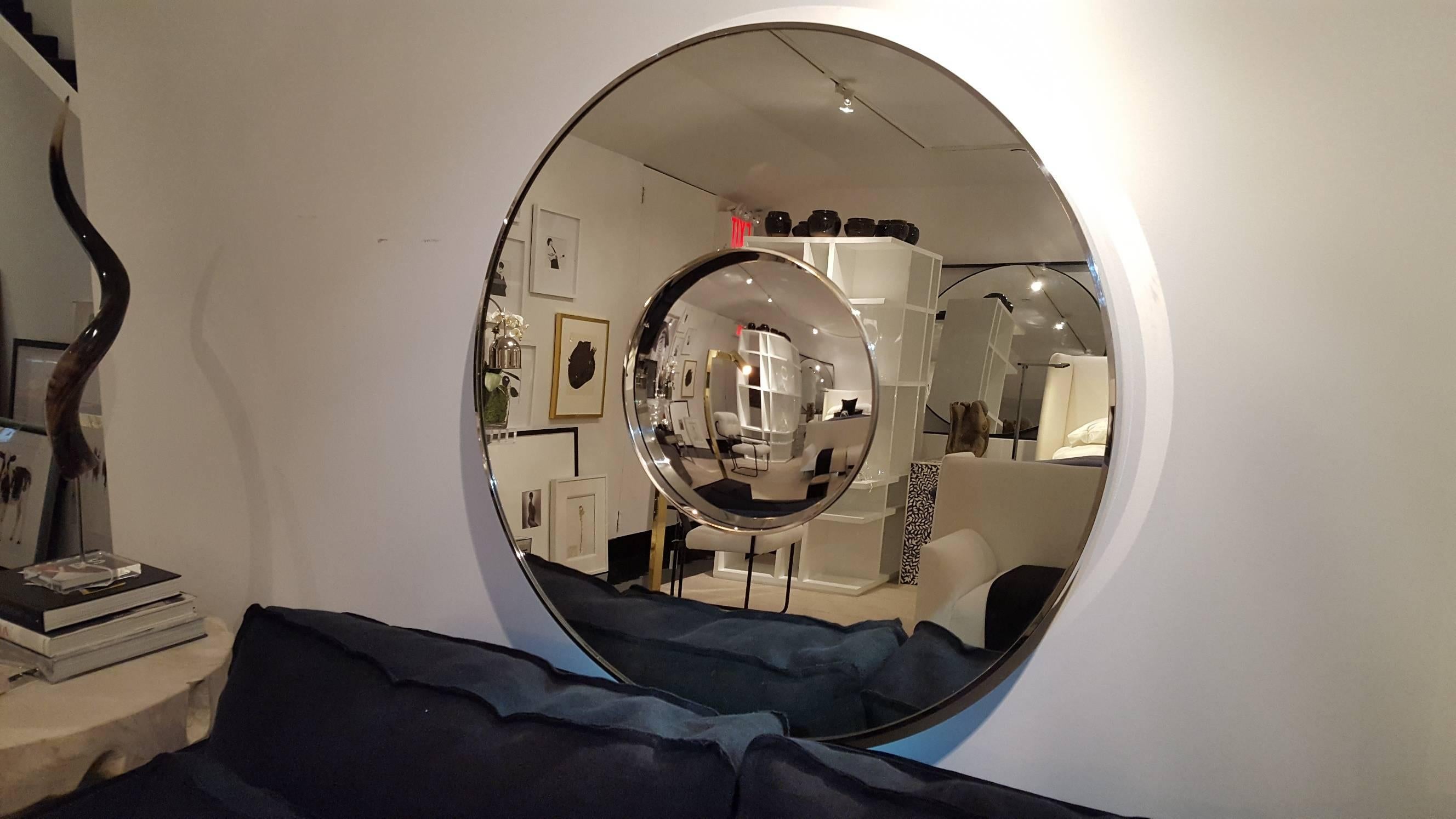 Gorgeous Mid-Century Modern bull's-eye wall mirror
Dimensions: 35