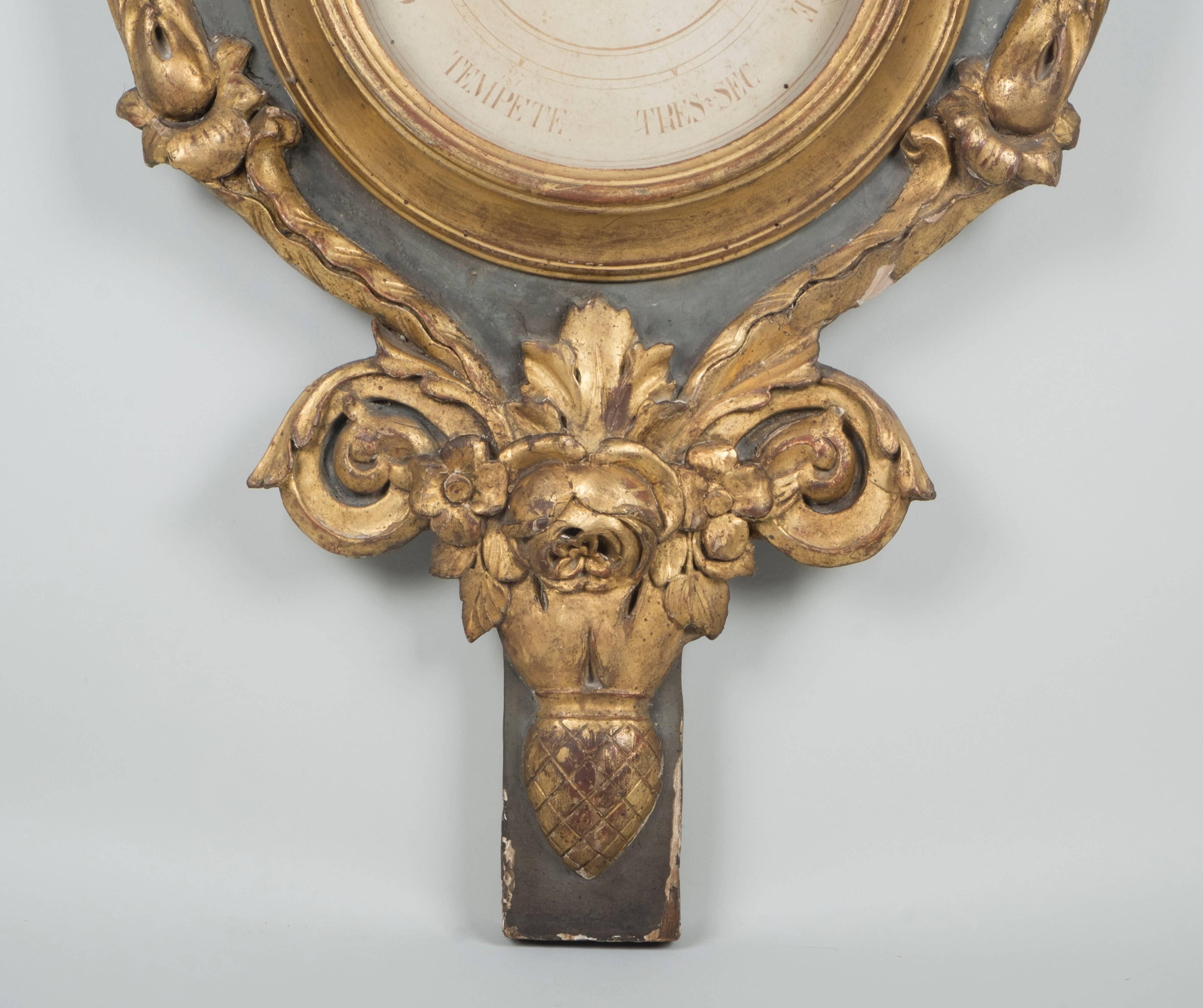 Pair of gilt and lacquered wood barometers and thermometers decorated with doves, horns of plenty, torches, arrows, laurels.

Work from the 18th century.

Dimensions:

123 cm H x 56 cm L.