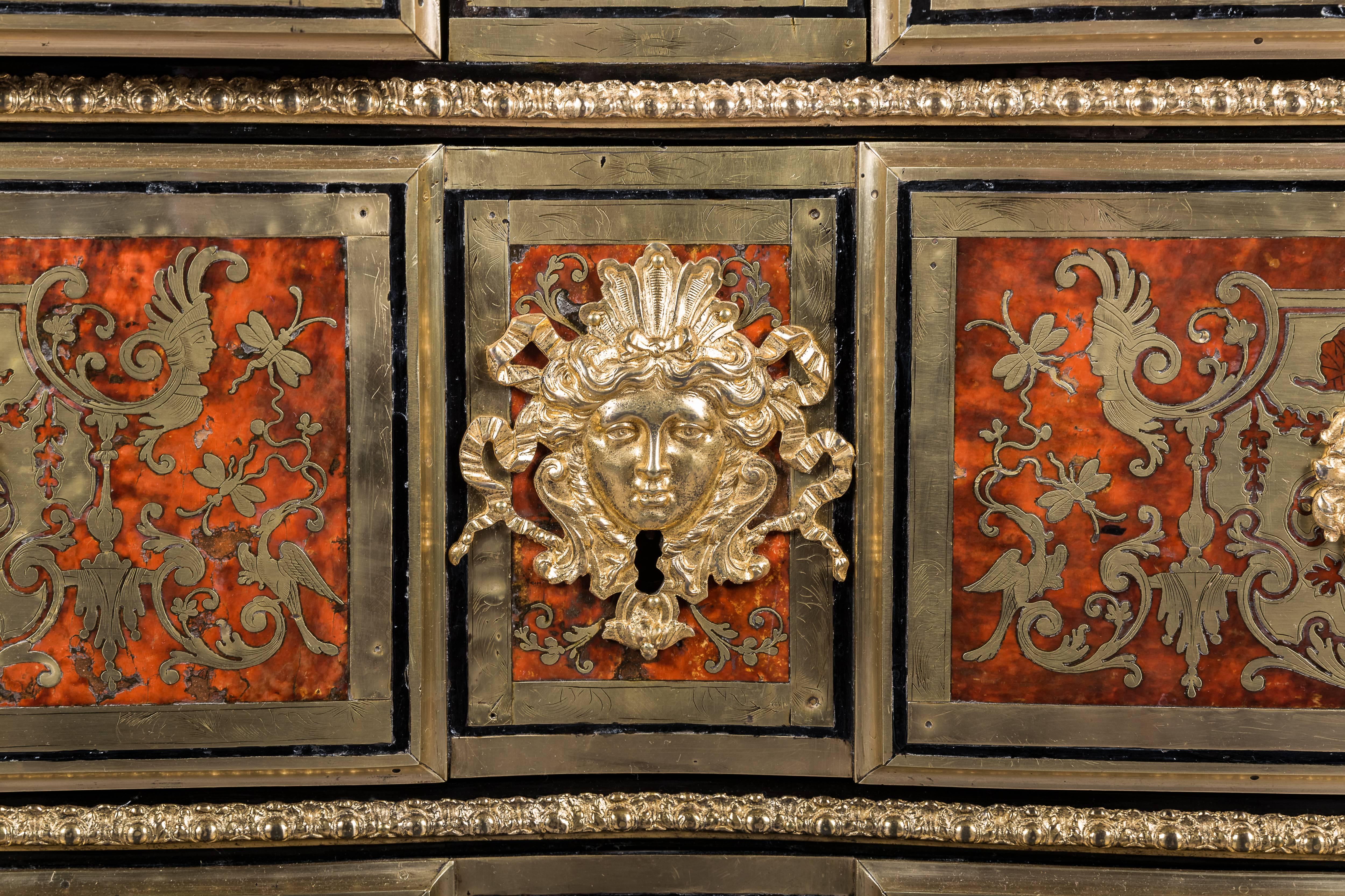 A Louis XIV ormolu-mounted, brass inlaud, red tortoiseshell and Boulle marquetry commode attributed to Nicolas Sageot, circa 1700
Inlaid overall with panels of scrolls and figures, the rectangular top with moulded edge, centred by the Medici