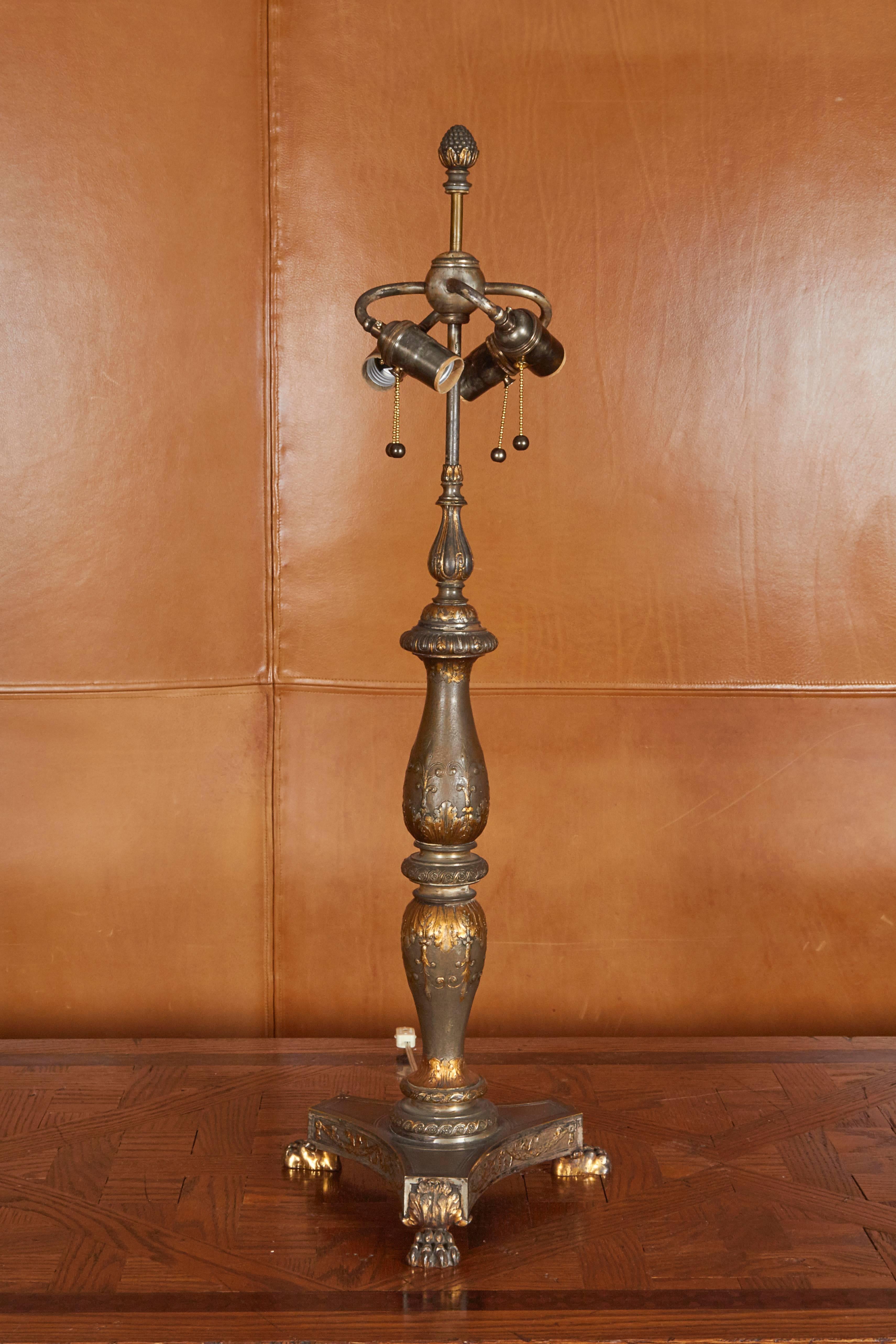 Large-scale table lamp most likely by the Birmingham, England firm Thomas Messenger and Sons who were one of the most important makers of oil and Argand lamps until the mid-19th century. Converted to electricity in the early 20th century.